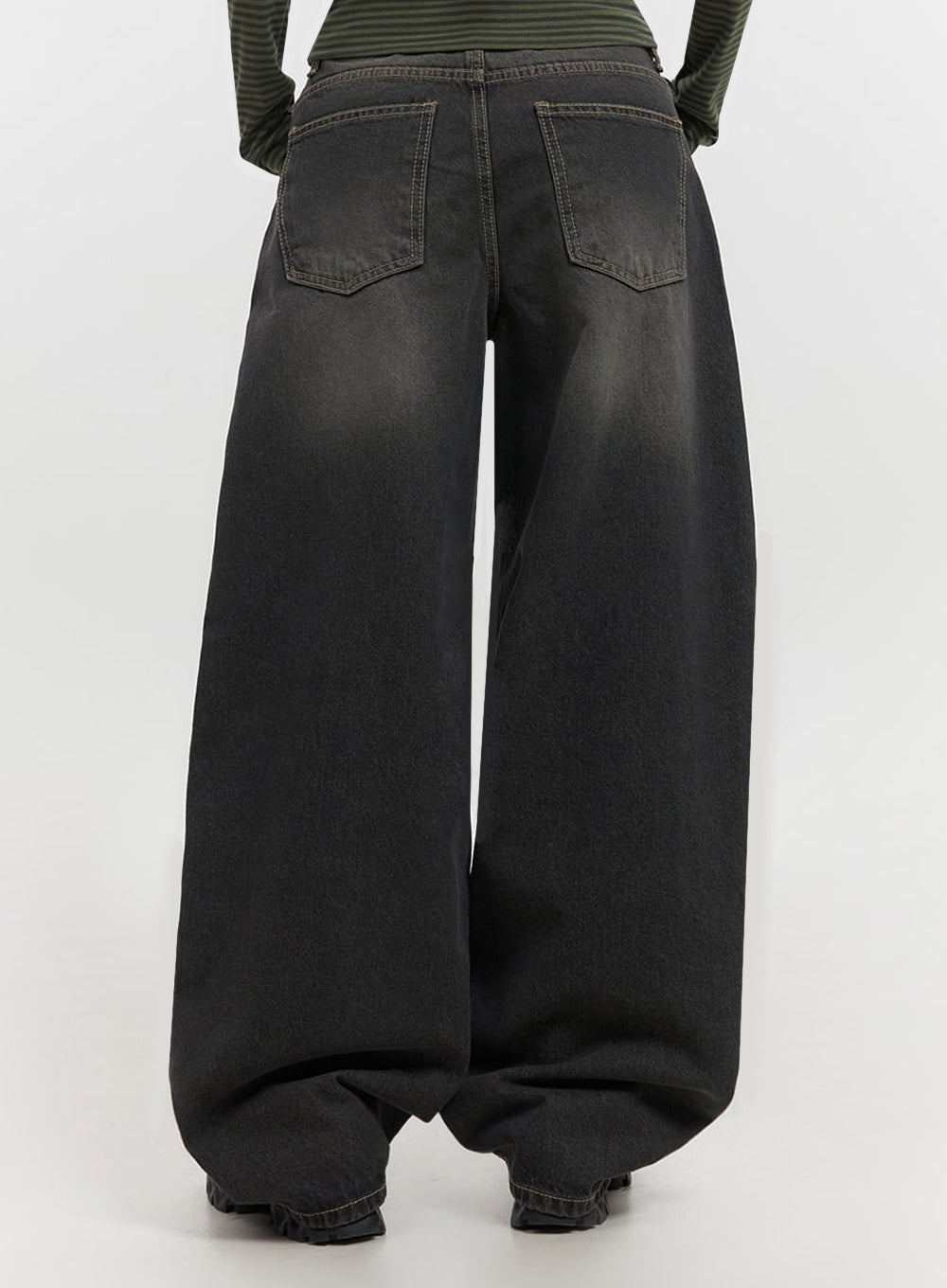 Skyla Washed Wide-Leg Baggy Jeans IF511 in washed black, back close-up from waist to hem on model, showing two back patch pockets, contrast topstitching, and voluminous leg sweep.