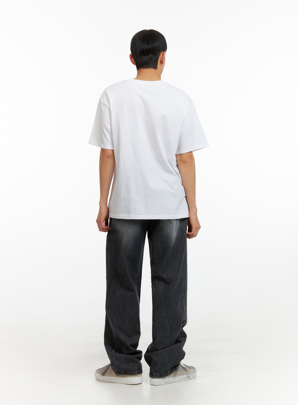 Men's Loose Fit Straight Jeans IU412 in washed black, full-length back view on model, wide straight leg with faded wash and slight hem stack, paired with white oversized tee and sneakers.