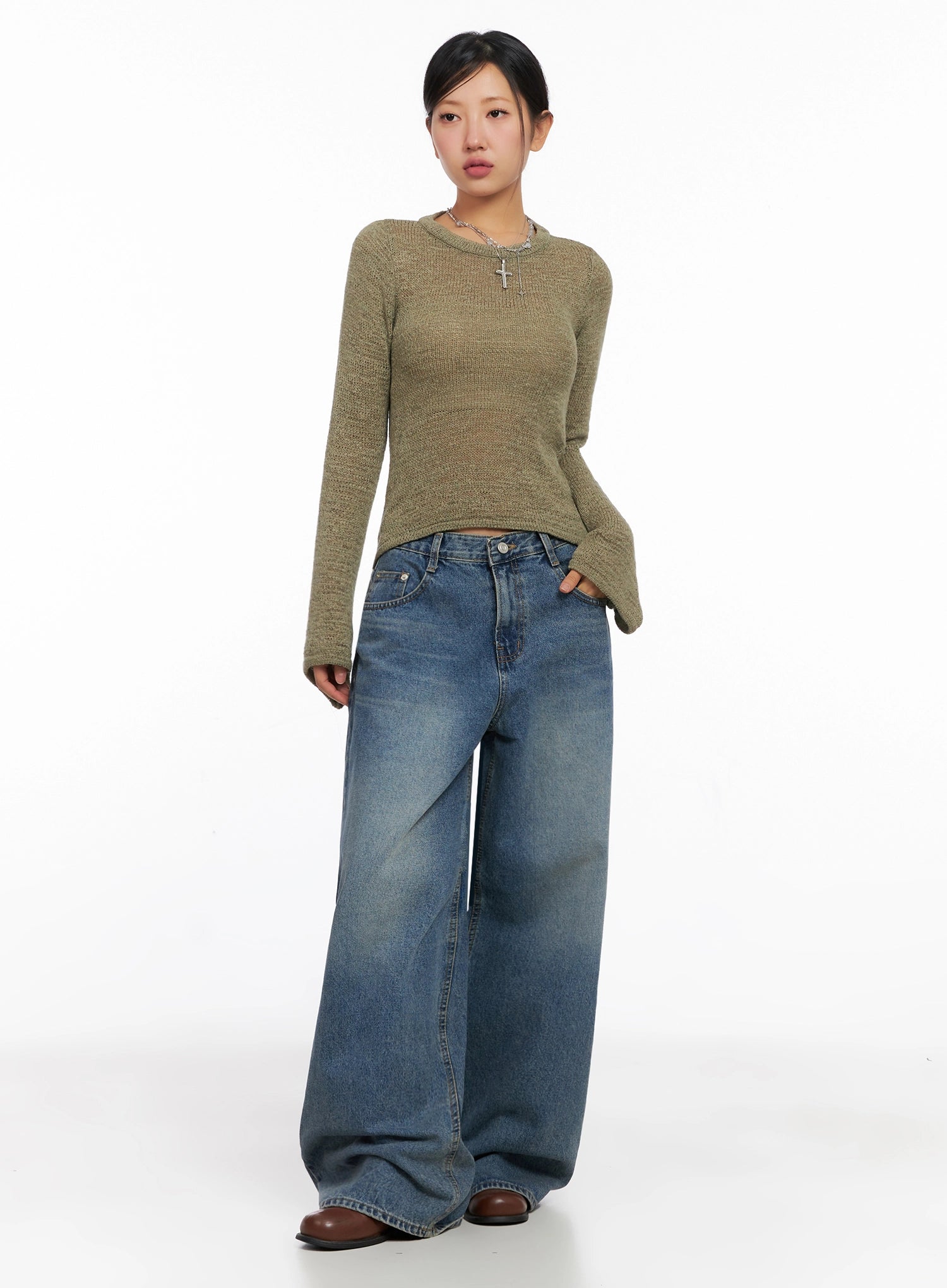Lilah Wide-Leg Washed Jeans IG527 in mid-blue, front full-body on model, wide-fit washed cotton denim, paired with olive knit top and brown loafers in casual street style.