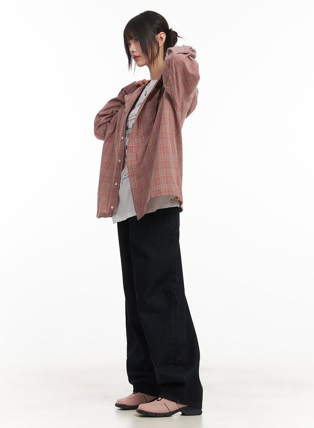 Dory Embroidered Baggy Jeans CF518 in dark blue, side full-body view on model, baggy wide denim leg styled with open pink plaid hooded shirt and graphic tee.