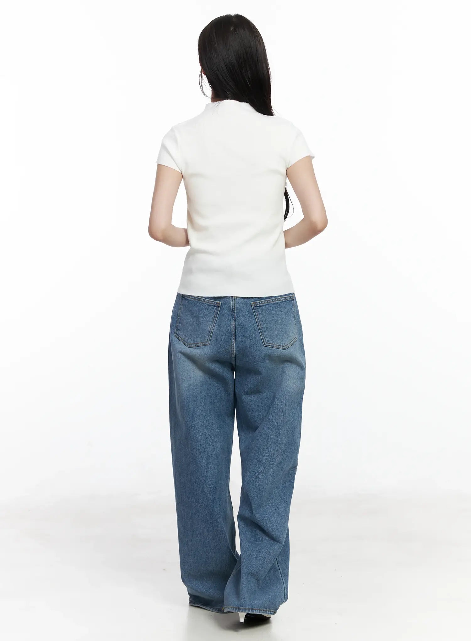 Ensley Wide Leg Jeans IJ529 in blue, full back outfit shot on model, washed cotton wide leg with back patch pockets visible, styled with white ribbed top.