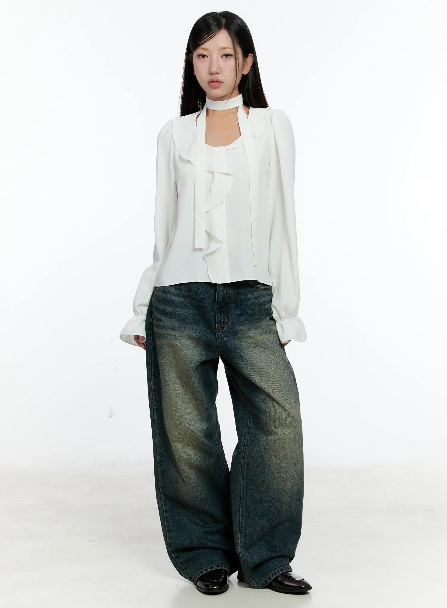 Lilian Vintage Wash Wide-Leg Jeans CS518 in vintage blue-green, front full-length on model styled with white ruffle choker blouse, wide-leg hem pooling over black loafers.