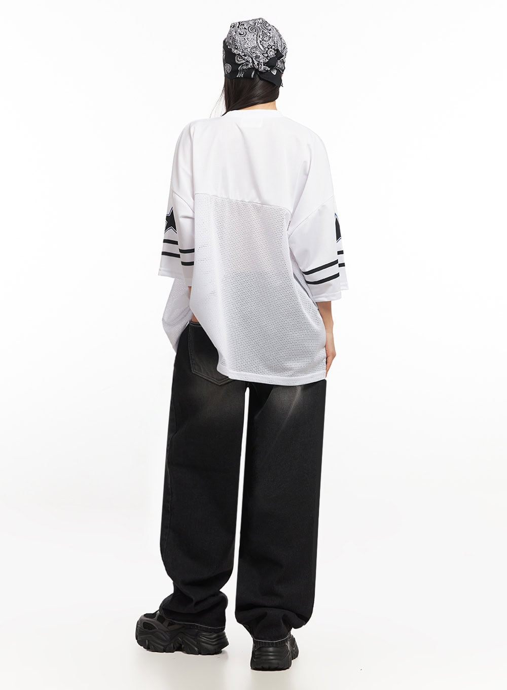 Alexis Stitched Wide-Leg Jeans IA504 in washed black, back full-length on model, wide-fit washed denim with contrast white topstitching, back pockets visible, paired with oversized jersey.