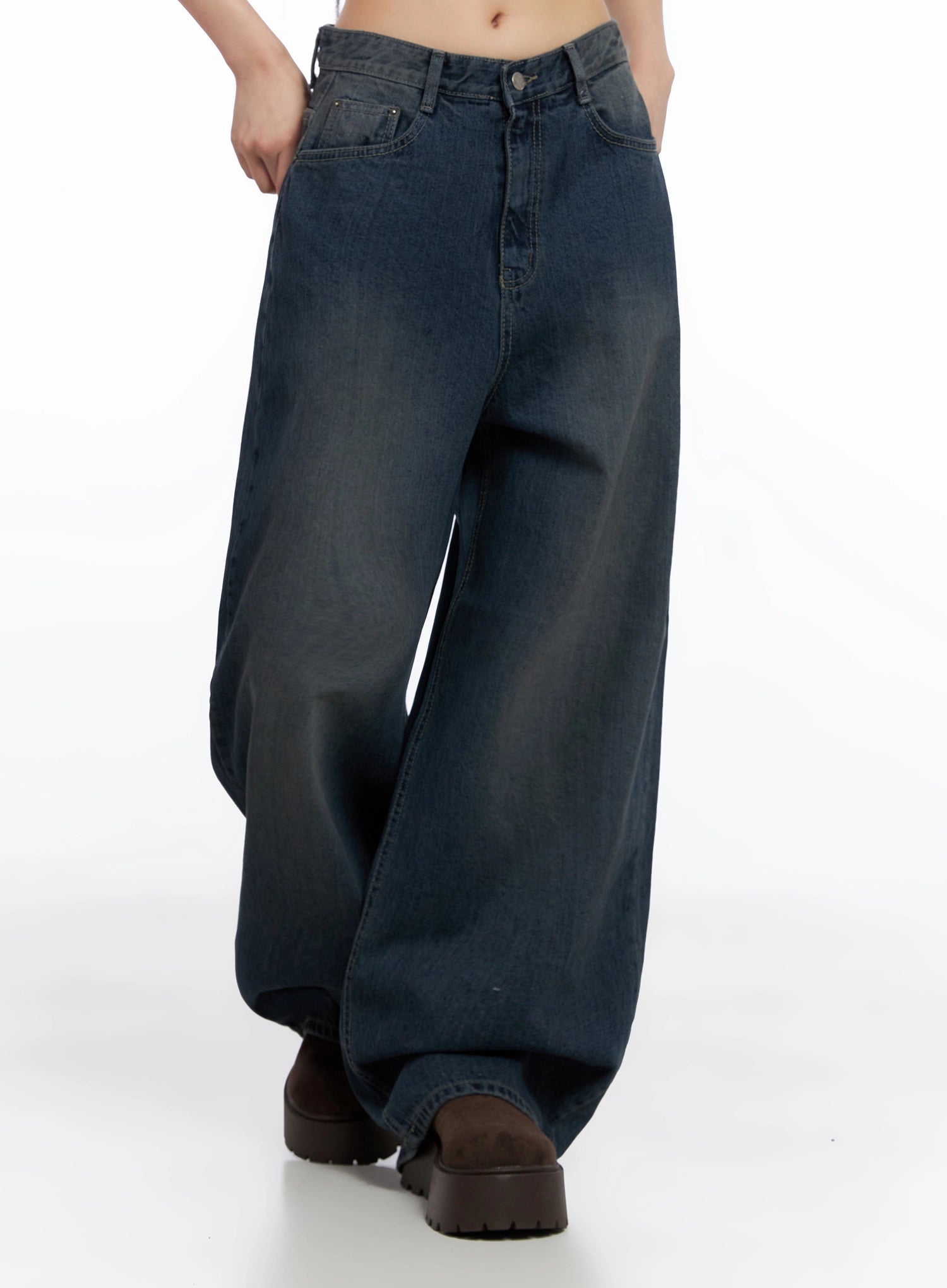 Adelyn Washed Baggy Jeans IS525 in dark blue, three-quarter front shot on model walking, highlighting ultra-wide baggy leg volume, washed gradient, and low-rise waistband detail.