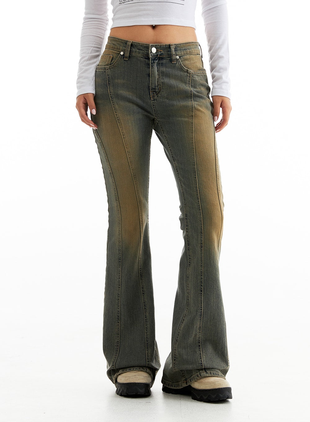 Stitched Bootcut Jeans CO313 in Blue, front mid-shot on model from waist to ankle, highlighting low-rise fit, amber-washed stitch panel seams, and slim bootcut shape.