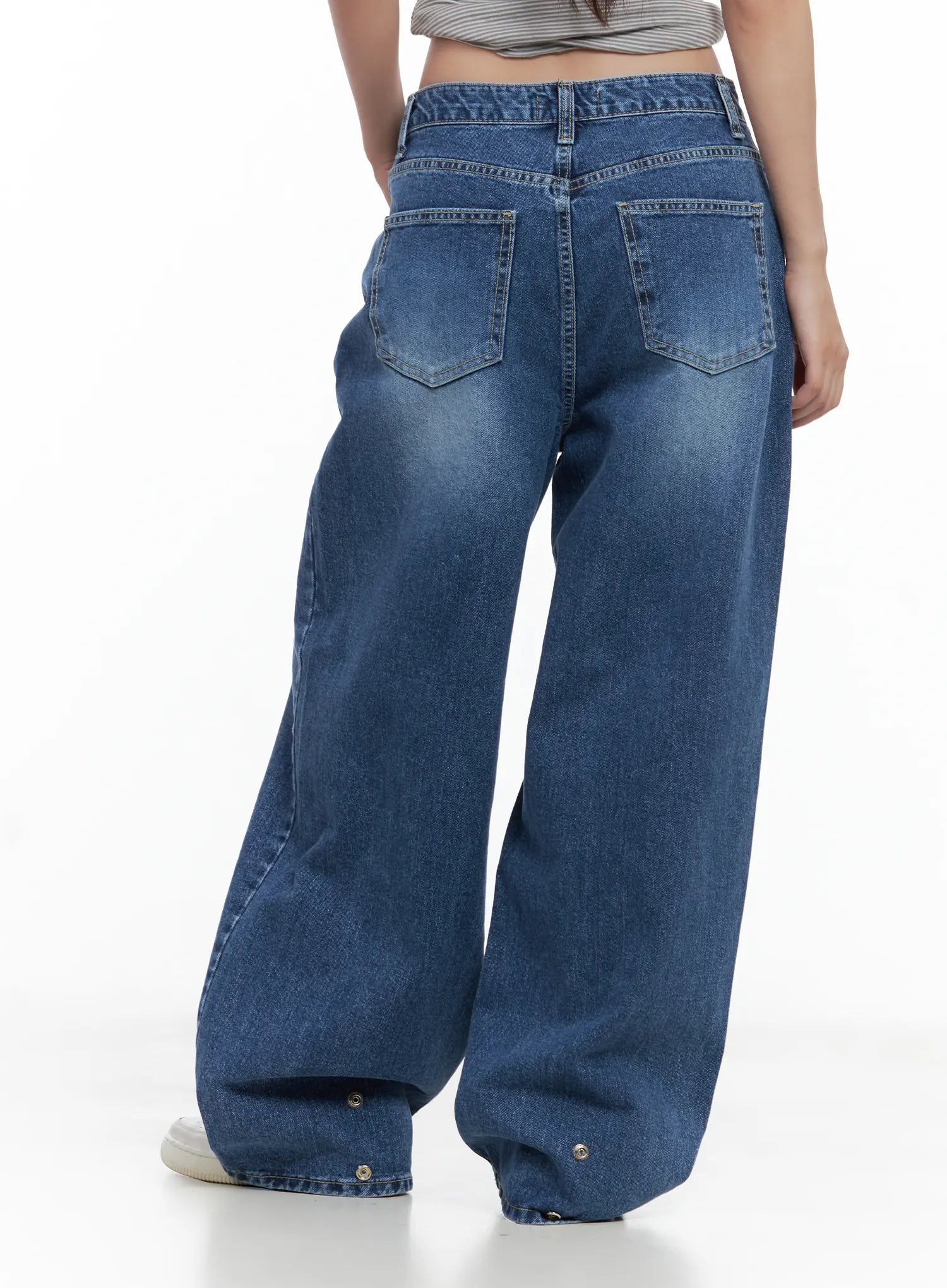 Hayoung Washed Wide-Leg Denim Jeans CL509 in dark blue, back close-up from waist to hem on model, dual rear pockets with contrast stitching, snap buttons at hem, washed cotton denim.