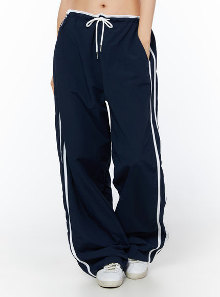 wide-leg-stripe-track-pants-iu516