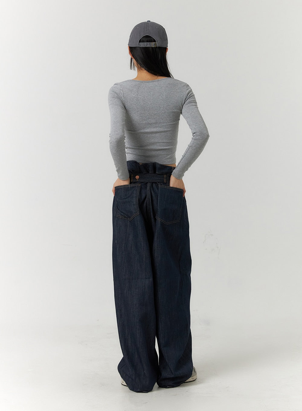 Back Button Wide Leg Jeans CF407 in blue, full back view on model, showing back button waist detail and large patch pockets on oversized wide-leg indigo denim.