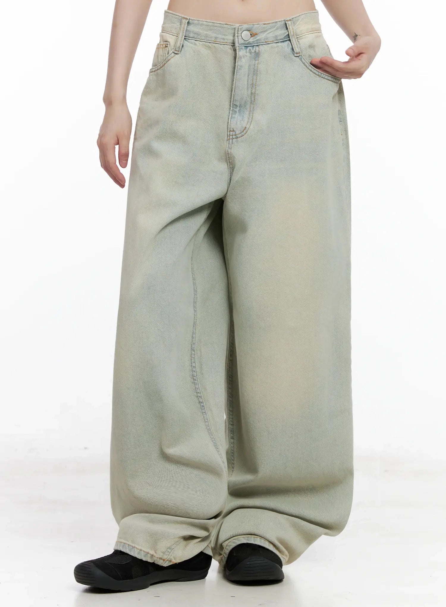 Xiaoting Vintage Style Wide-Leg Denim IL531 in light blue, front mid-body shot on model, ultra-wide leg with soft faded wash and voluminous hem drape, one hand in pocket.