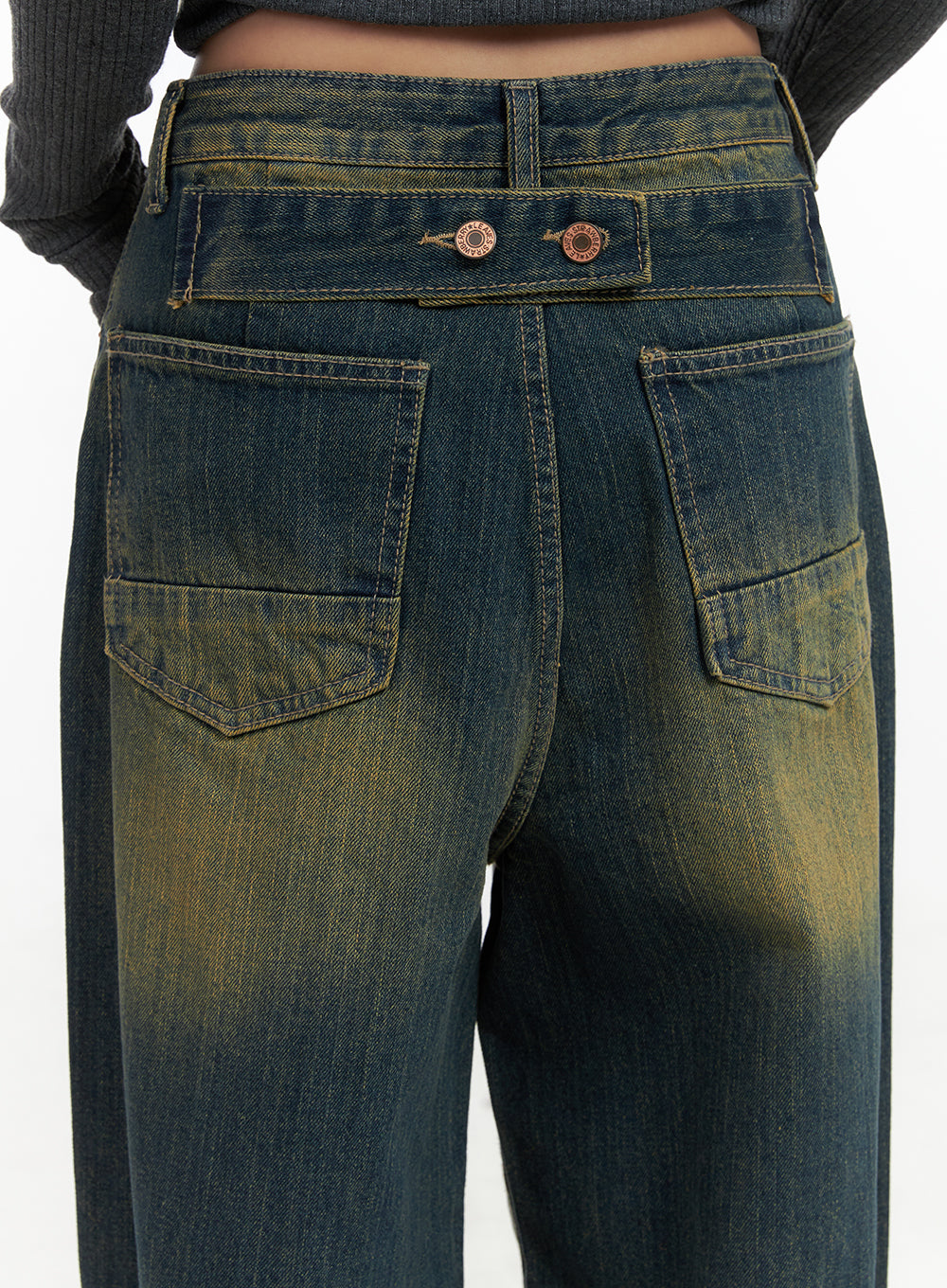 Georgia Vintage Wash Baggy Denim Jeans CO414 in dark blue, back waistband close-up detail, copper branded button closures and patch pockets with yellow vintage wash texture on dark denim.