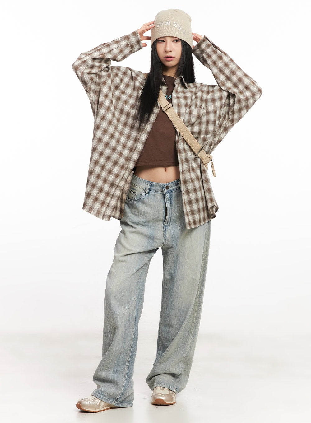 Jessi Washed Wide-Leg Jeans CA514 in light blue, full-body front shot on model, wide-leg washed denim layered with open plaid overshirt, brown crop top, bucket hat, and crossbody bag.