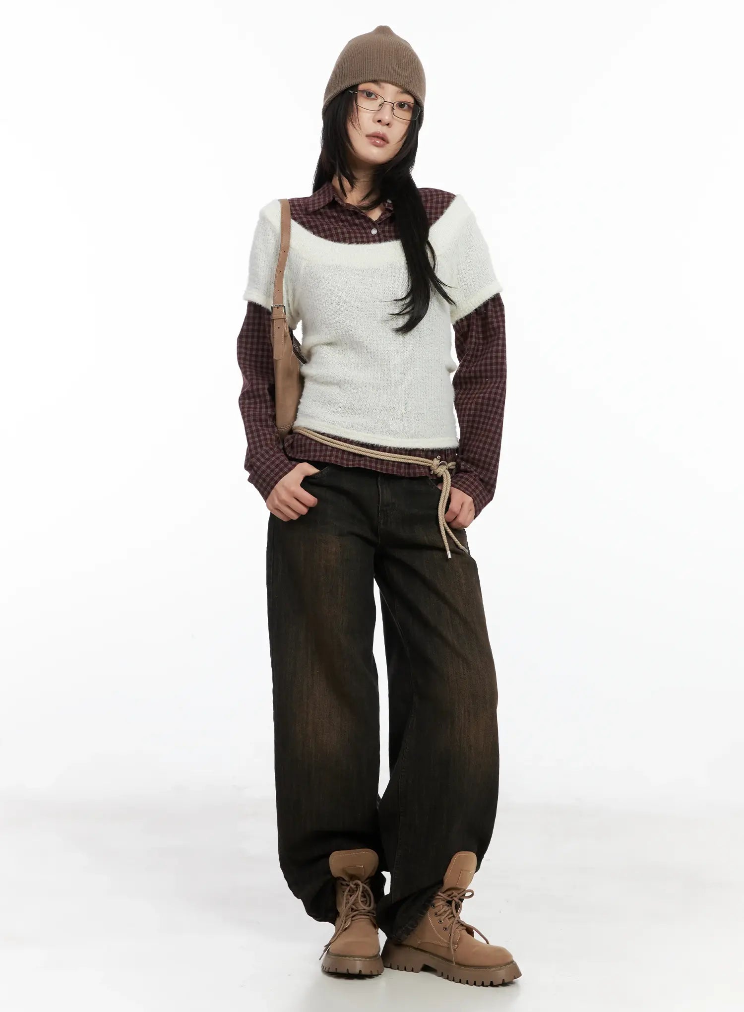 Winnie Brown Baggy Jeans CD502 in Black, full-body front on model styled with knit vest, plaid shirt, beanie, crossbody bag, and lug-sole boots for a layered fall look.