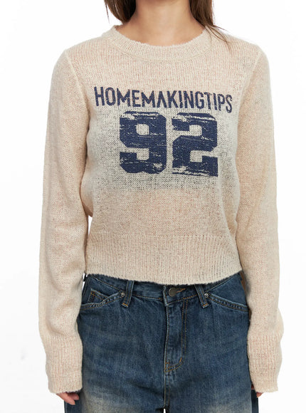 sheer-graphic-cropped-sweater-co510