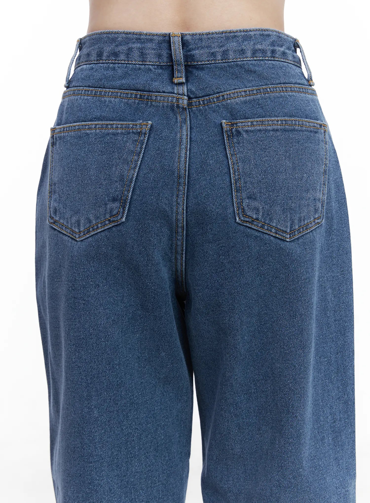 Ashlyn High-Waist Fleece-Lined Wide-Leg Jeans CJ507 in blue, macro close-up of back waistband and dual pockets, showing washed cotton texture and gold contrast stitching detail.