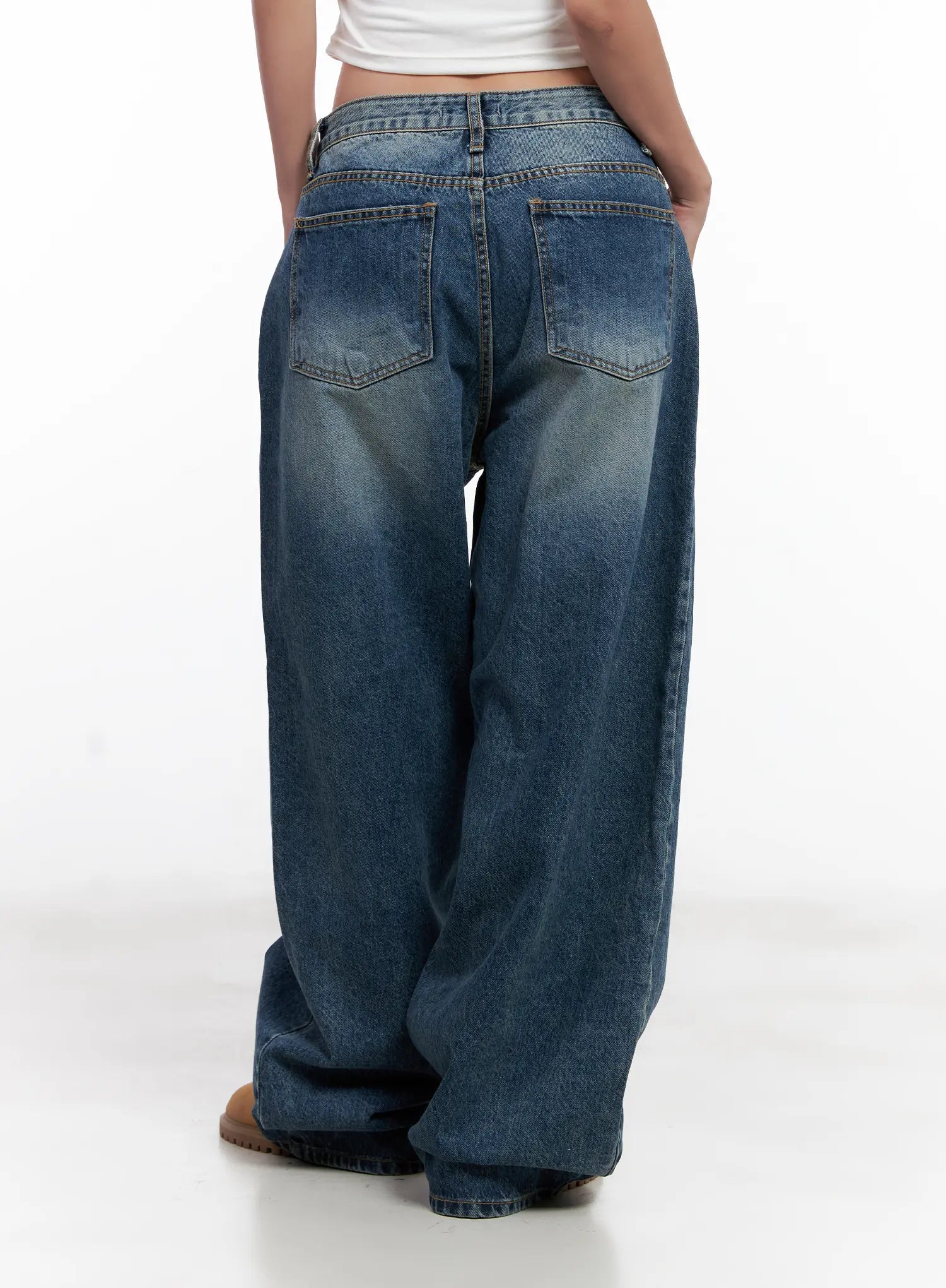 Miji Wide-Leg Washed Denim Jeans CL521 in dark blue, straight back product shot waist-to-hem on model, dual back pockets with contrast stitching, wide balloon leg, washed cotton finish.