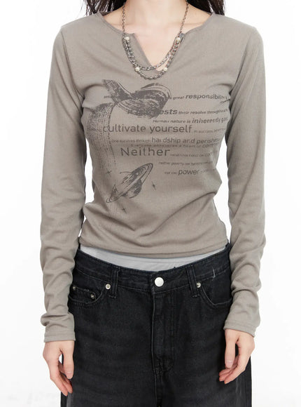 v-neck-ribbed-graphic-long-sleeve-top-cm519