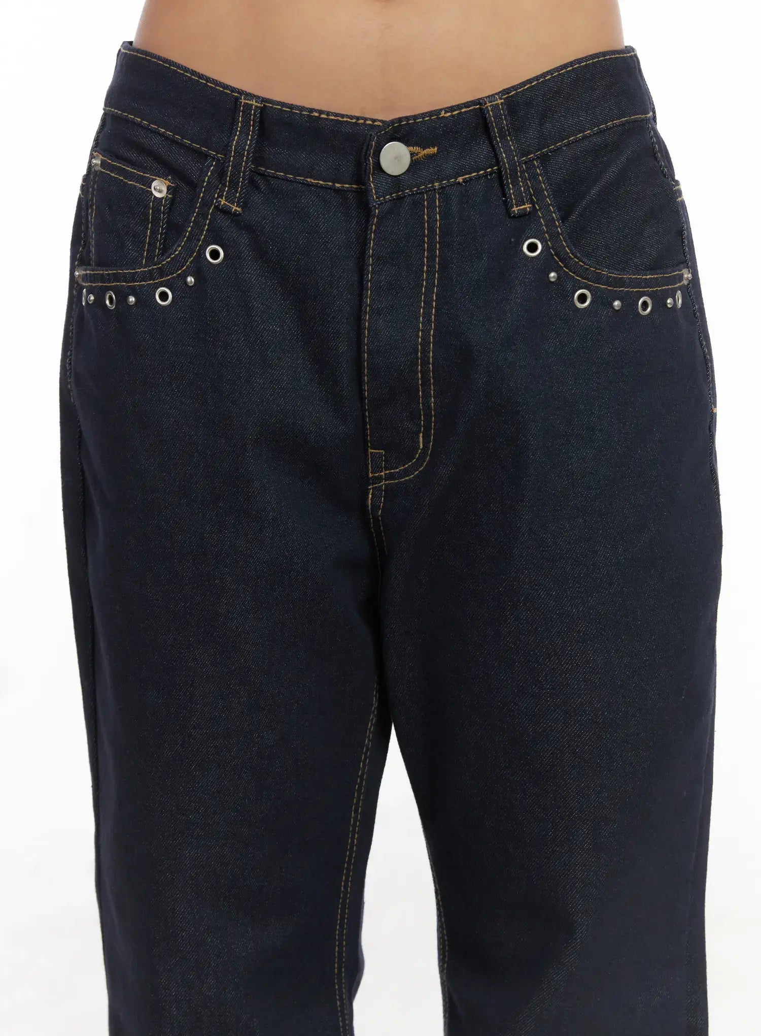 Bunn Non-Fade Eyelet Bootcut Jeans CJ512 in dark blue, waist close-up detail shot, silver eyelet hardware along front pocket edges, contrast topstitching, button fly, low-rise fit.