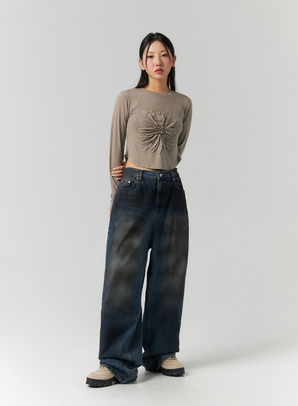 Tie-Dye Washed Wide Leg Jeans CS320 in dark blue, full-body slight side-front view on model, showcasing wide leg silhouette and tie-dye washed cotton denim with crop top styling.