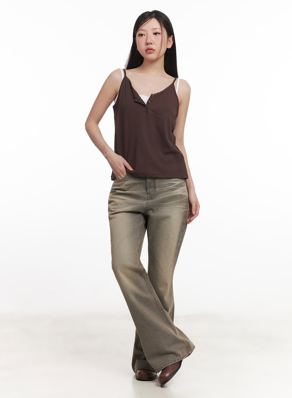 Sherry Washed Slim-Fit Bootcut Jeans IM528 in vintage brown, full-body front view on model, washed slim-fit bootcut with flared hem, paired with dark brown cami top and brown boots.