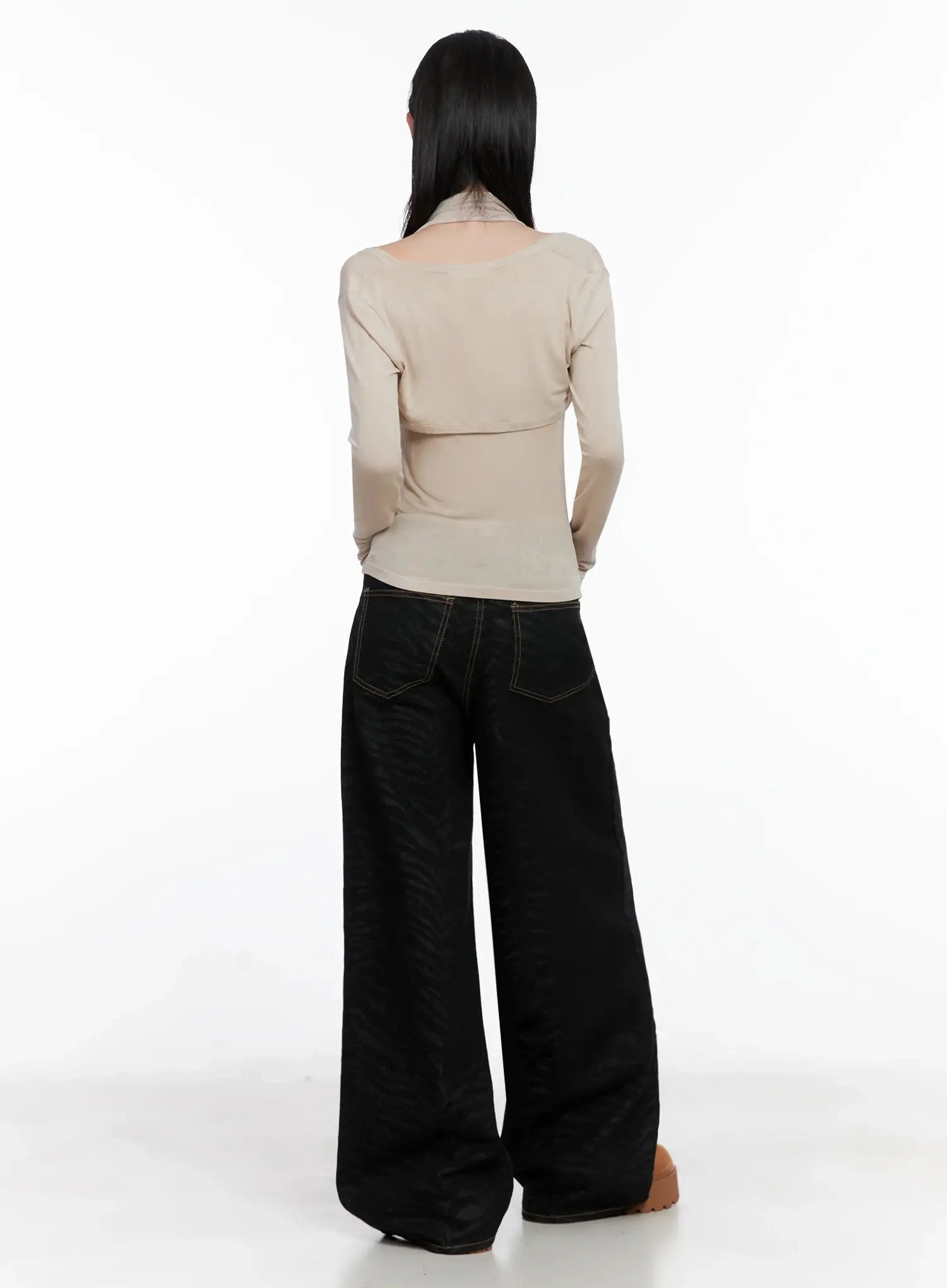 Freyja Animal Print Wide Leg Jeans IS508 in black, full-length back view on model, wide-leg zebra-print cotton denim with gold contrast stitching and back patch pockets.