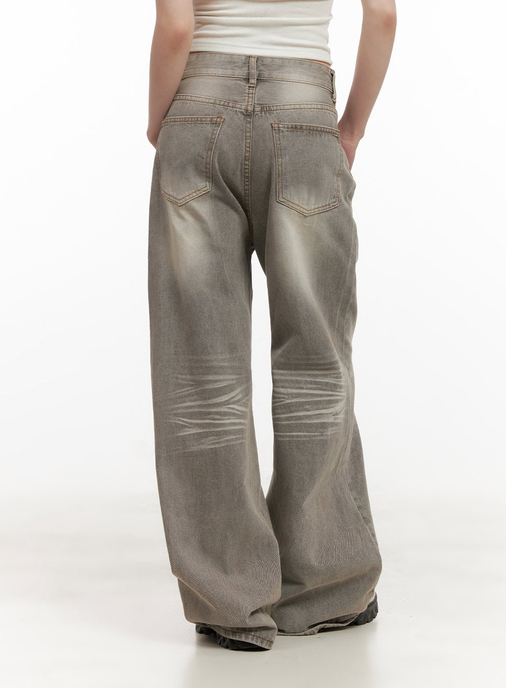 Hollie Vintage Wide-Leg Jeans CD426 in gray, back close-up on model, washed cotton denim with back patch pockets, heavy whiskering behind knees, and wide-leg hem pooling at floor.