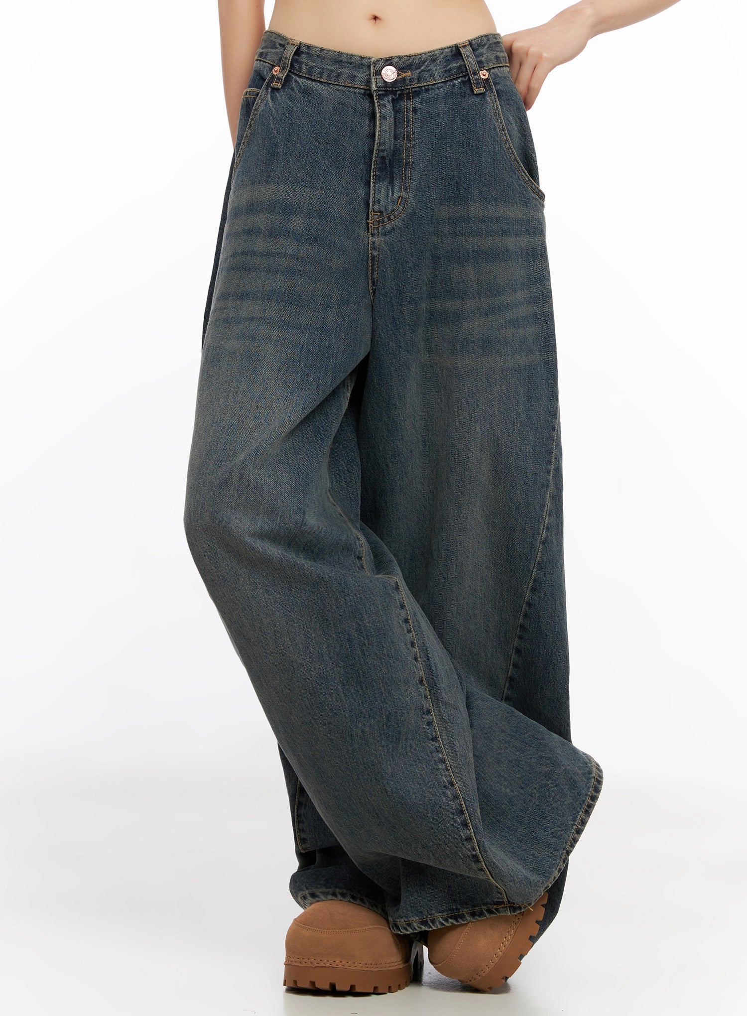Skyler Washed Balloon Fit Jeans IN503 in blue, front mid-shot on model without top styling, showing voluminous balloon leg drape and washed fade, mid-rise waist with front pockets.