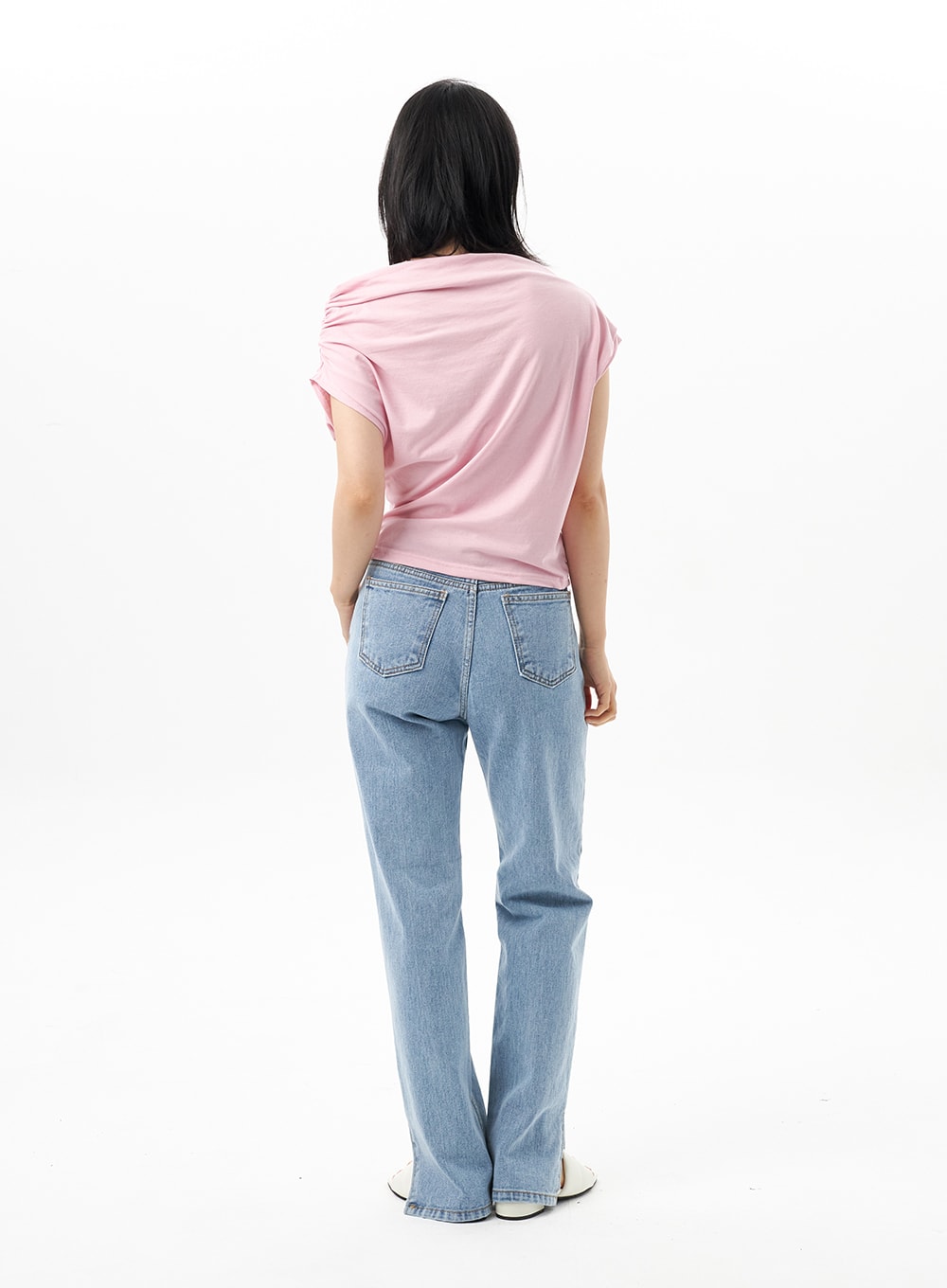 Slit Detail Jeans OU314 in blue, back full-length view on model, straight-fit high-waist denim showing back pockets and ankle slit hem, paired with pink top.
