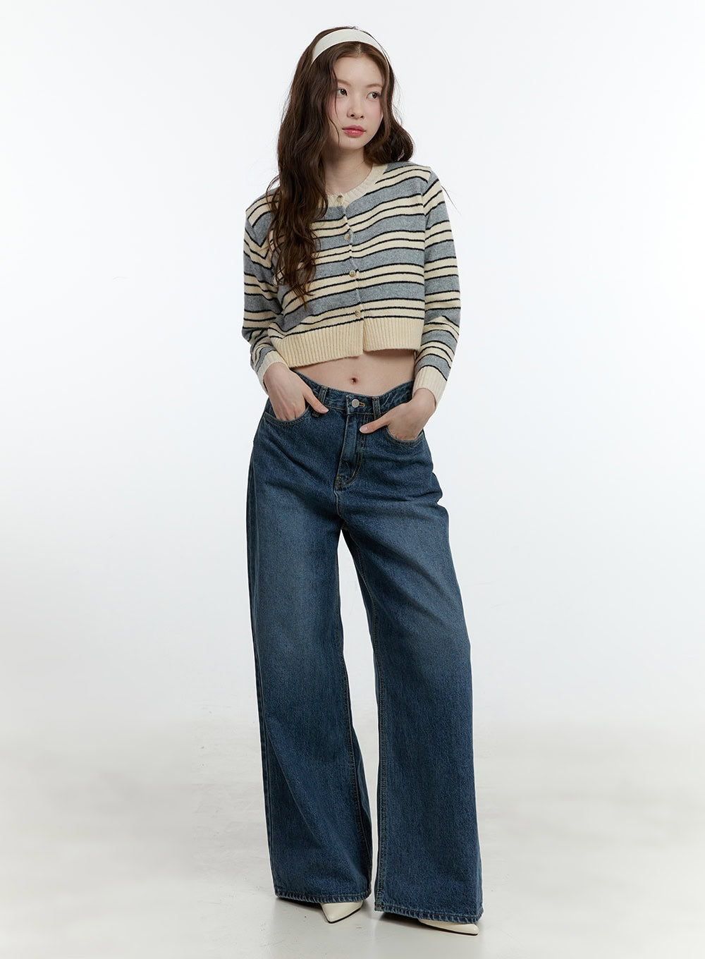 Klaudia Wide-Leg Jeans CF503 in blue, front full-length shot on model, high-waist wide-leg washed cotton denim, paired with cropped striped knit cardigan and white headband.