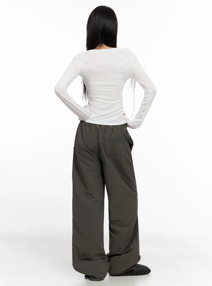 assymetric-cut-out-long-sleeve-top