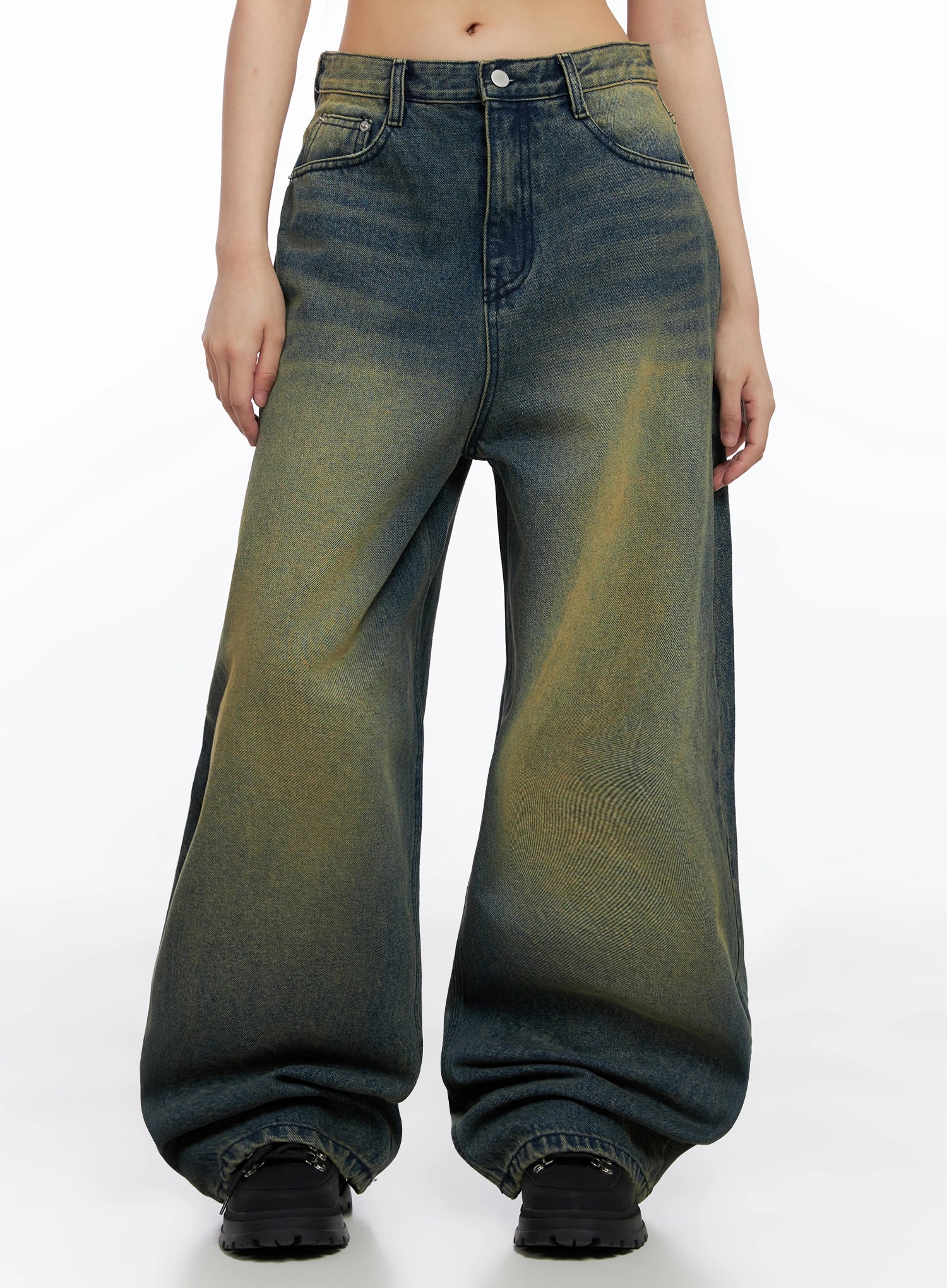 Elora Washed Baggy Jeans IS525 in dark blue, front crop shot on model, wide-fit cotton denim with prominent yellow-green centre wash fade, high waist, front pockets, pooling hem.