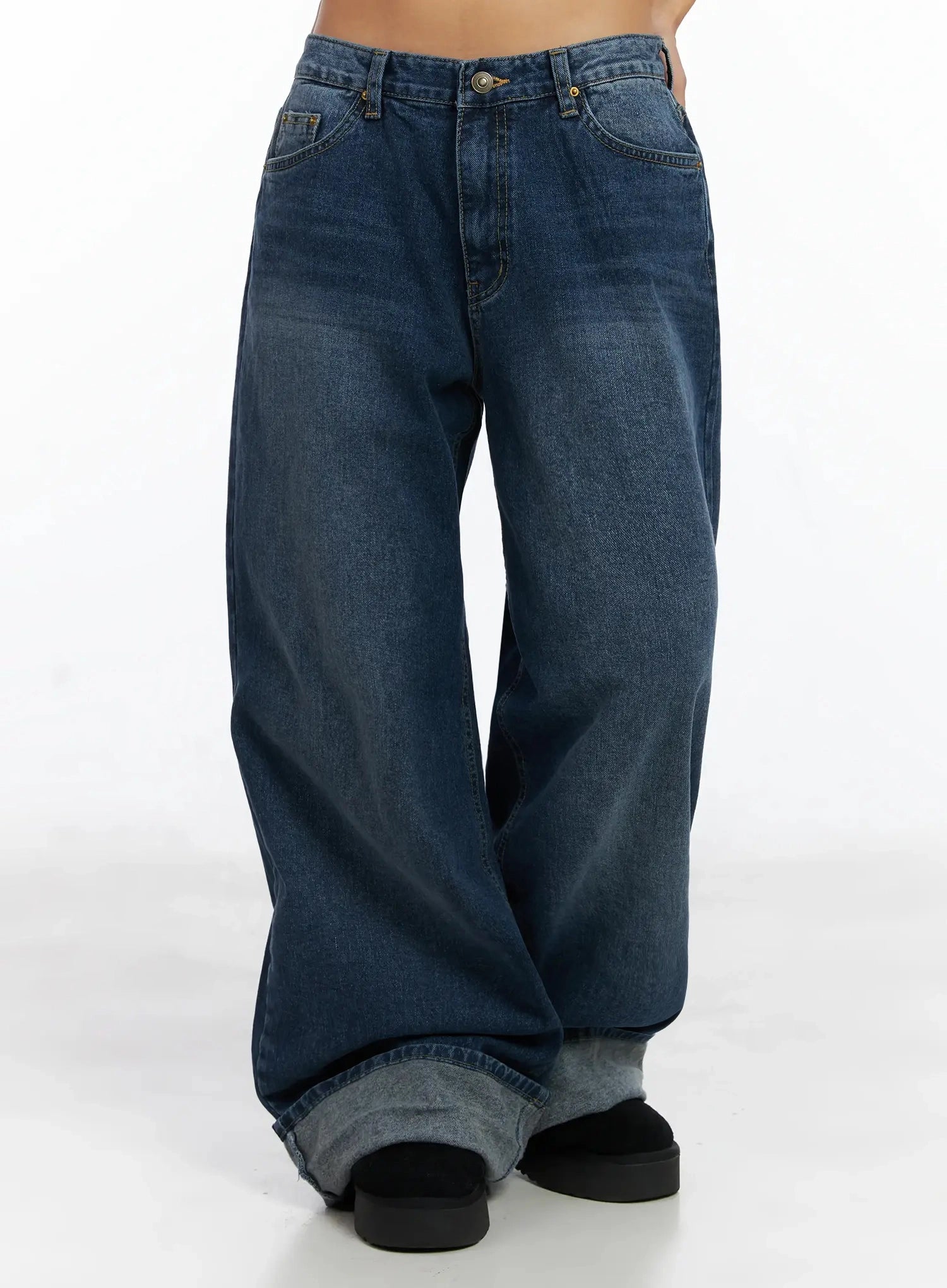 Anahi Baggy Jeans IN528 in blue, front cropped shot from waist to floor on model, deep indigo washed cotton wide leg with contrast grey oversized cuff.