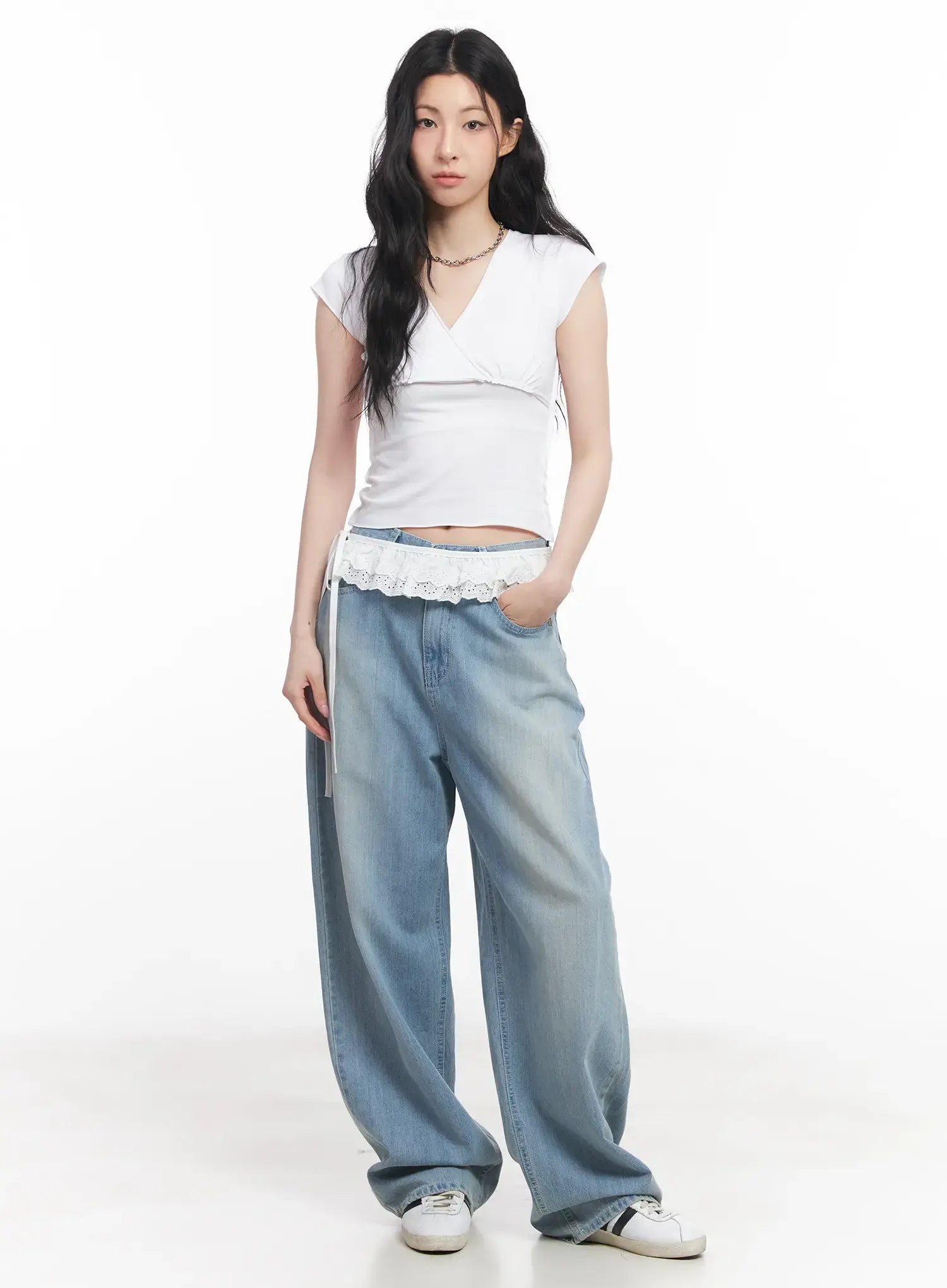 Rose Washed Baggy Summer Denim Jeans CU511 in light blue, front full-length view on model, wide-fit washed denim paired with white wrap crop top and lace ruffle waist layer, white sneakers.