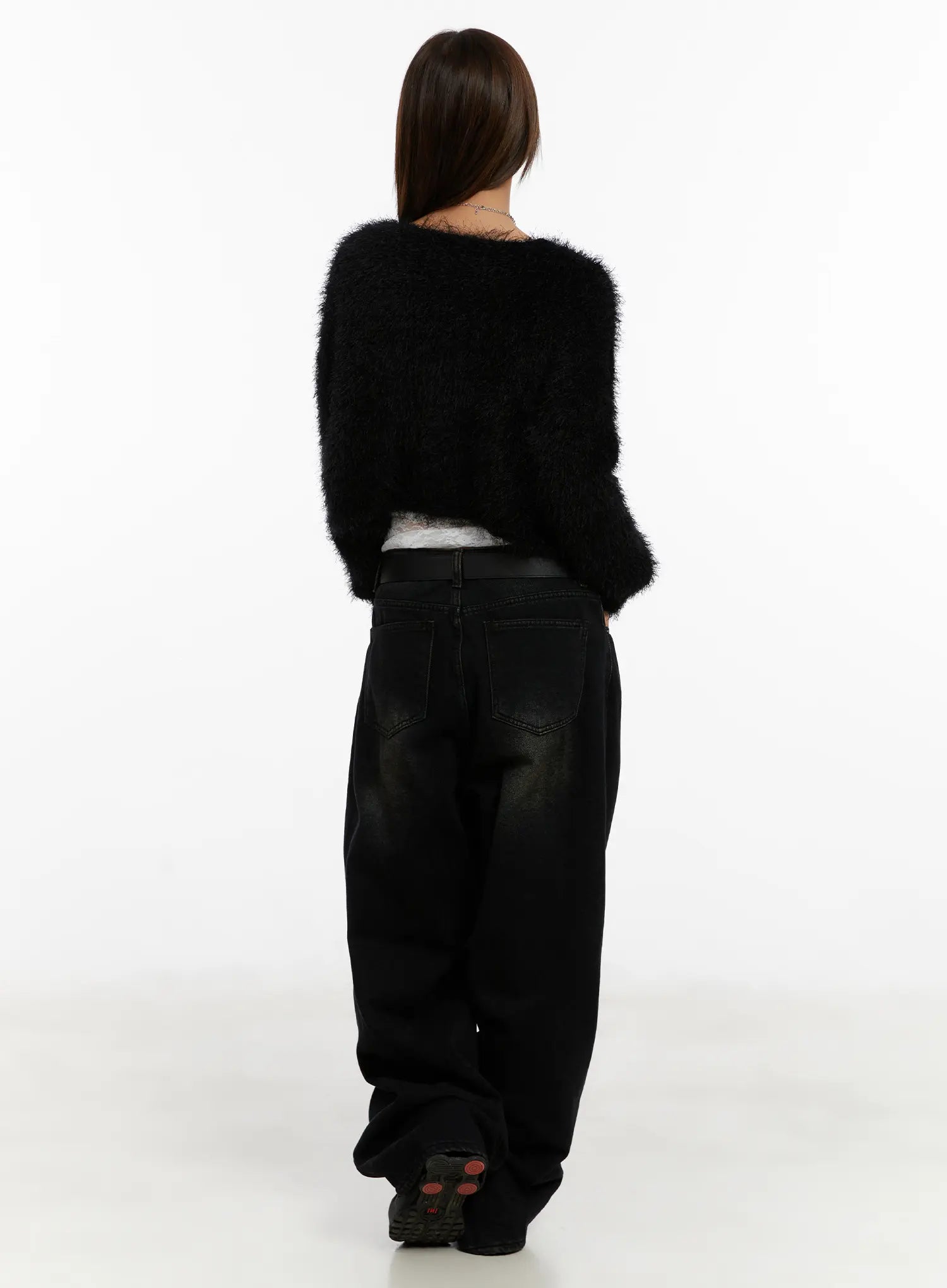 Myla Dark Wash Wide-Leg Jeans CD512 in dark black wash, full back view on model, wide-leg silhouette with dark olive faded wash, styled with black fuzzy cropped cardigan.