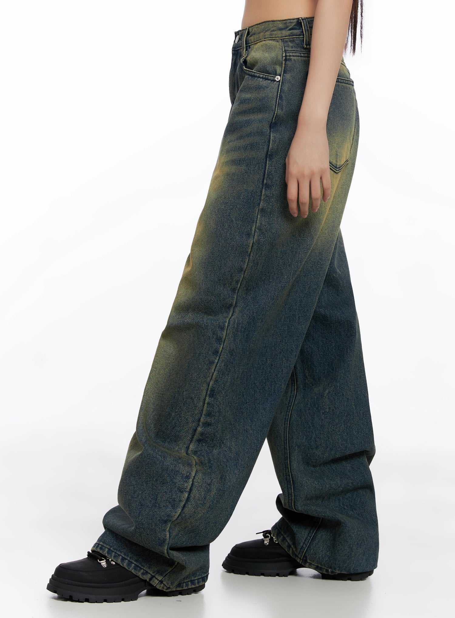 Elora Washed Baggy Jeans IS525 in dark blue, side view on model, full-length wide baggy leg with yellow-green washed fade along seam, long inseam pooling at ankle.