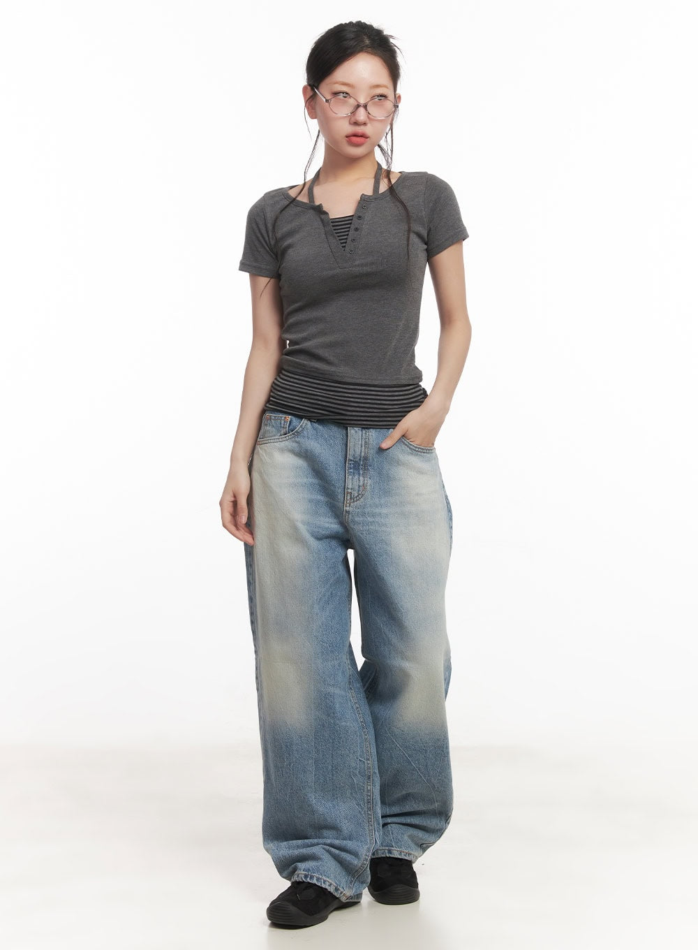 Lumira Back-Detail Washed Wide Leg Jeans CA530 in blue, full-length front view on model wearing glasses, washed wide-leg denim with sun-faded finish, paired with grey layered top.