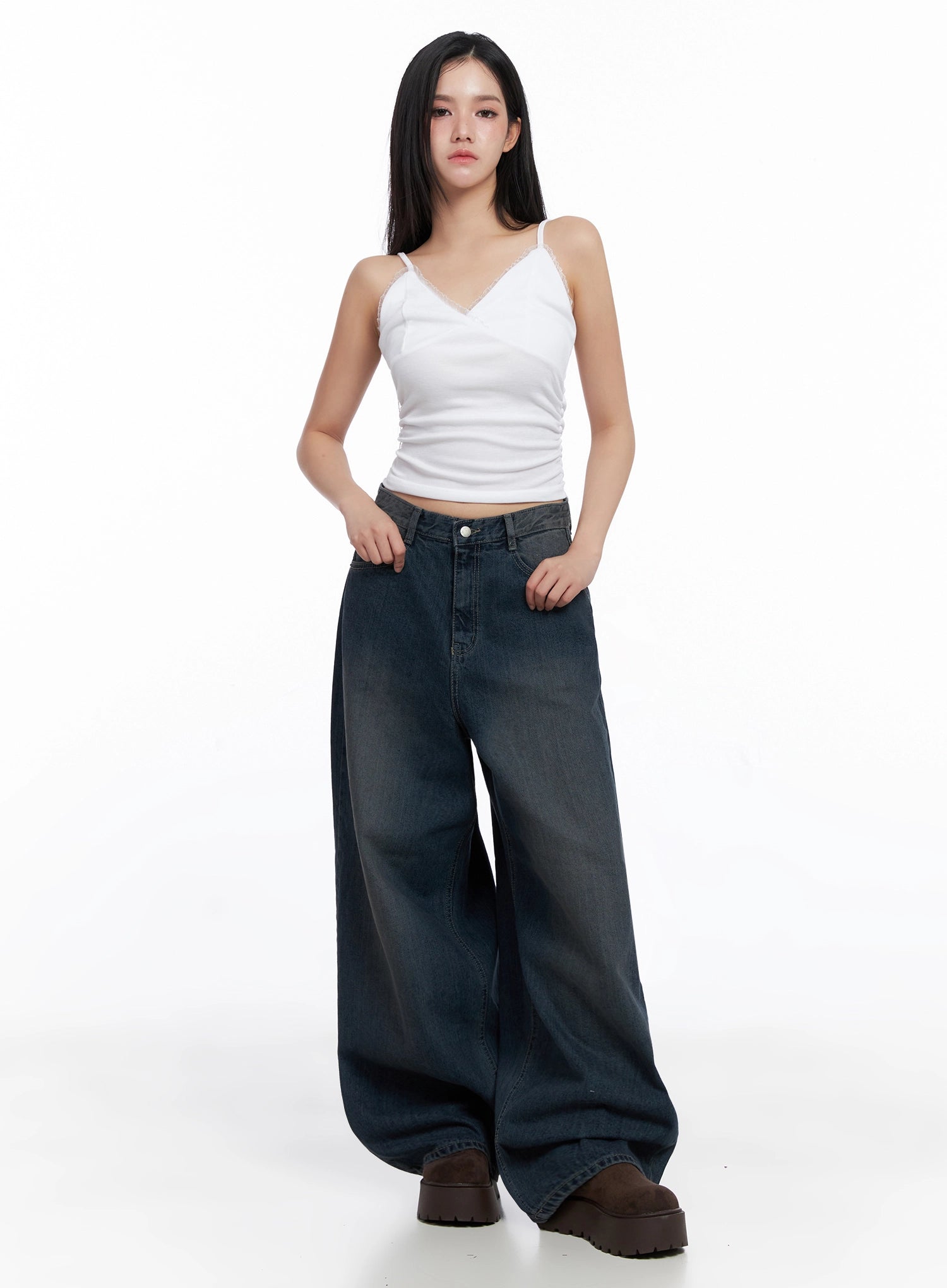 Adelyn Washed Baggy Jeans IS525 in dark blue, front full-body outfit shot on model, oversize wide-leg washed cotton denim styled with white lace cami top and brown platform shoes.
