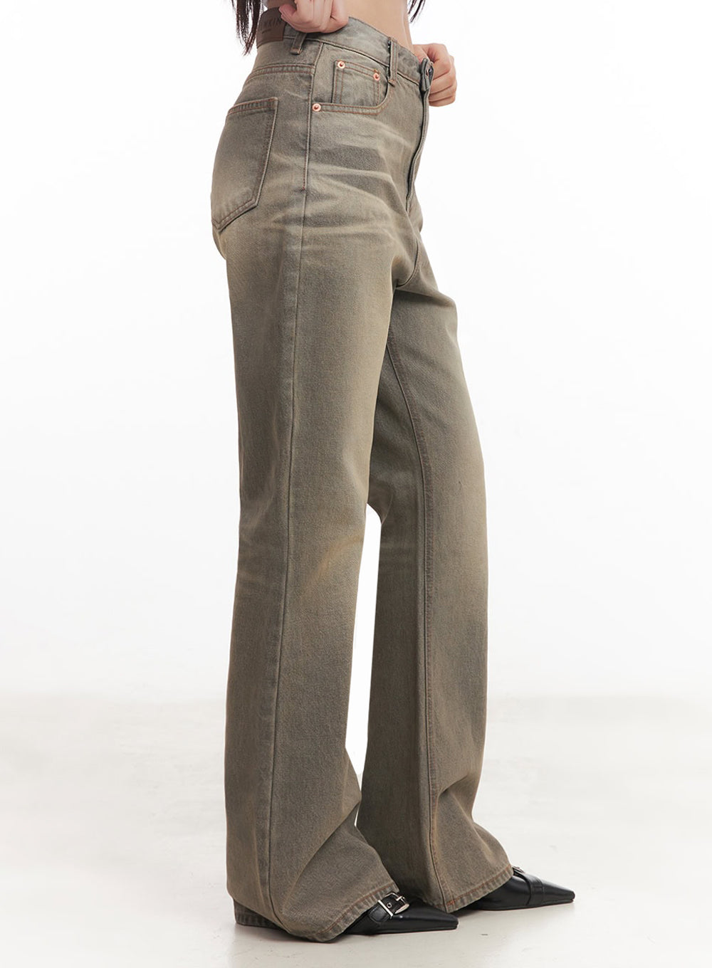 Sherry Washed Slim-Fit Bootcut Jeans IM528 in vintage brown, side-view close-up from waist to hem on model, showing slim thigh taper and subtle bootcut flare, washed cotton denim texture.