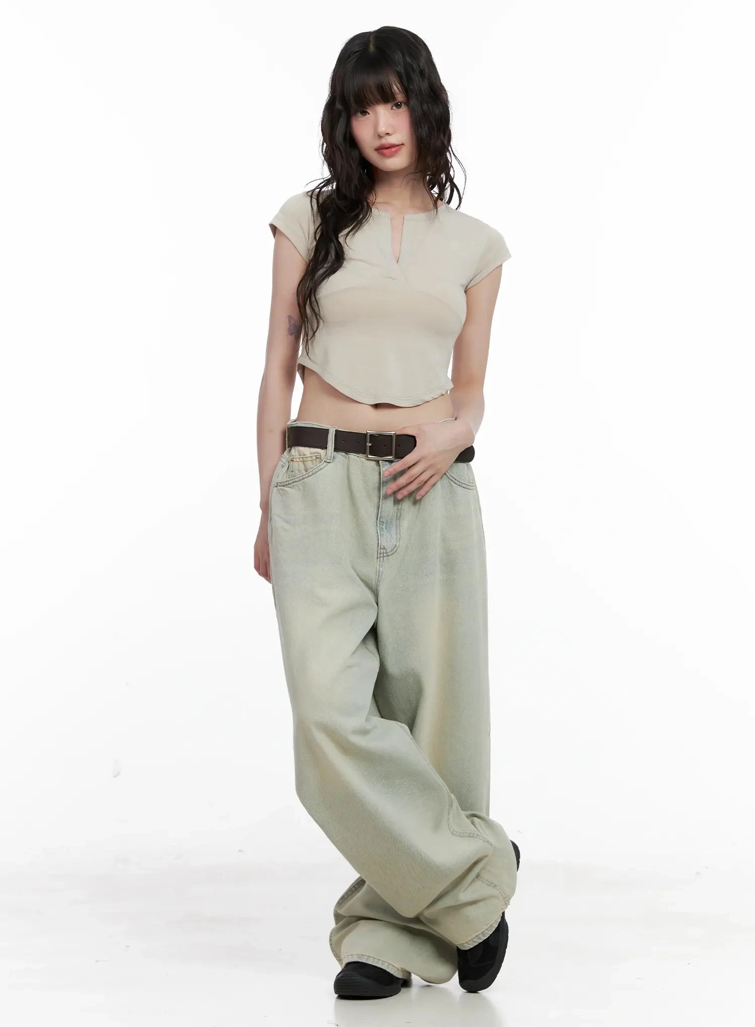 Xiaoting Vintage Style Wide-Leg Denim IL531 in light blue, full-length front shot on model, wide-leg washed denim paired with beige crop top and brown belt, relaxed casual look.