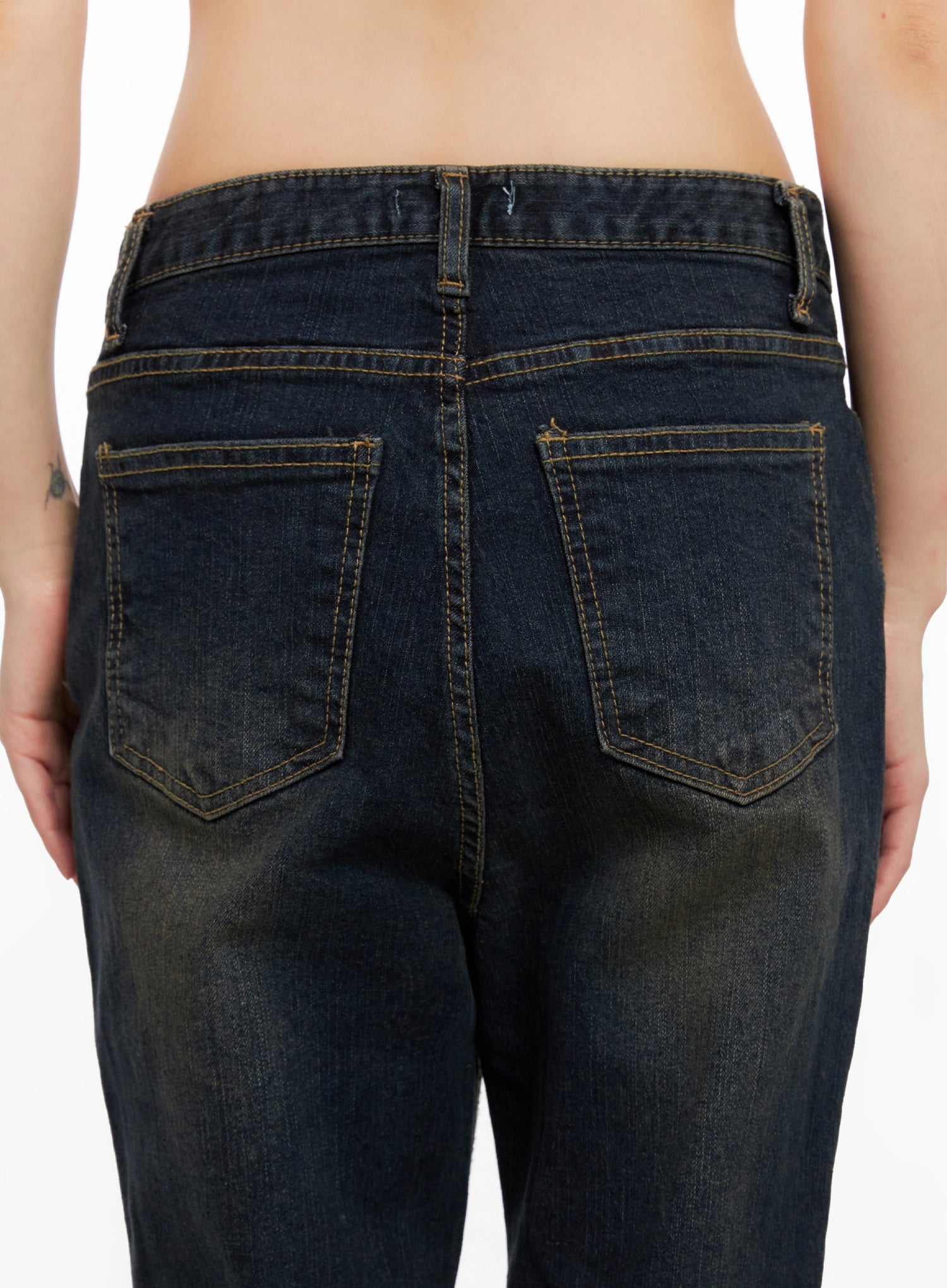 Lyanna Vintage Wash Bootcut Jeans IN503 in dark blue, close-up back detail, dual patch pockets with topstitching, center seam, and vintage wash fading on cotton-spandex denim.