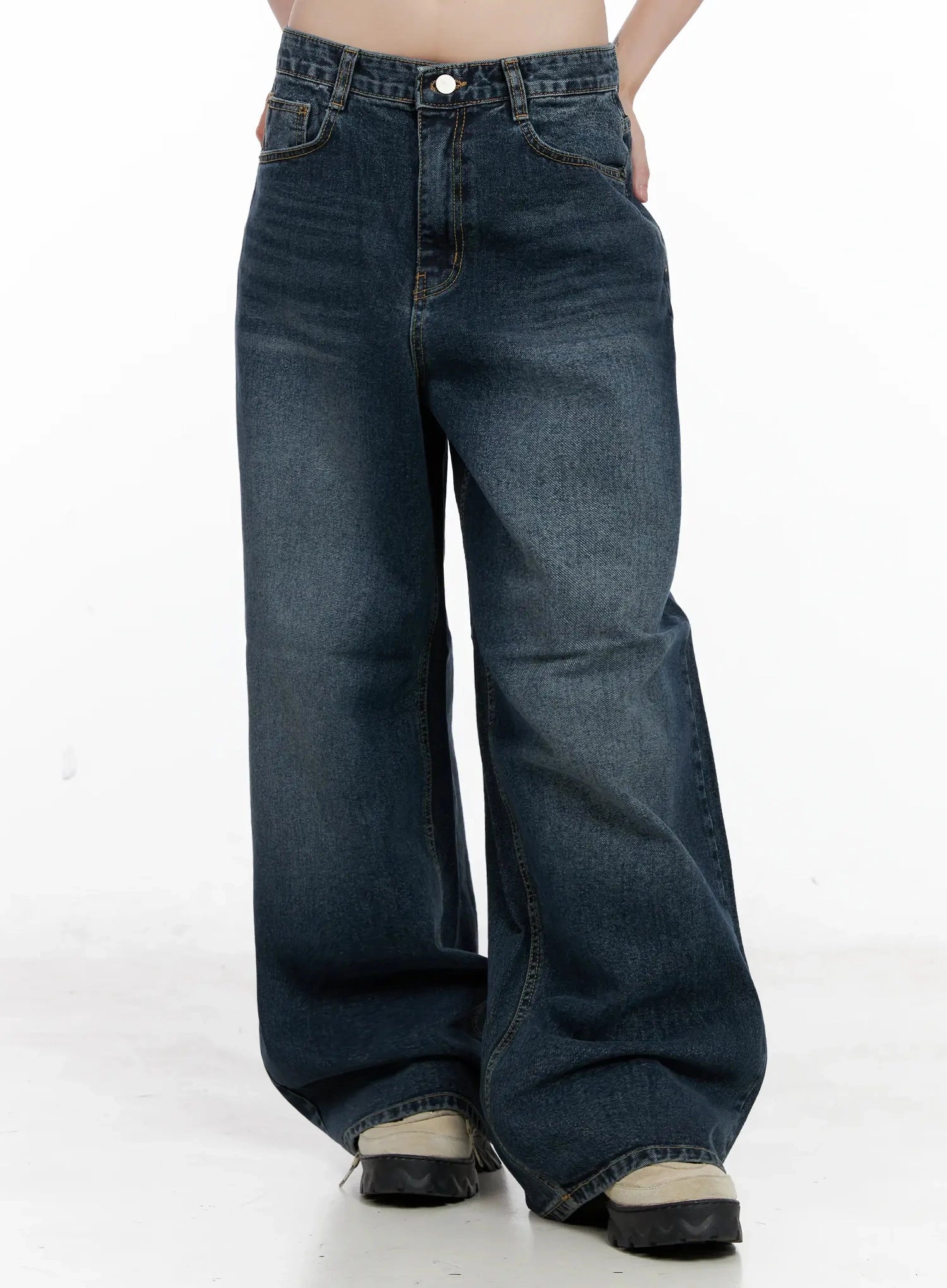 Mashiro Vintage-Wash Wide Jeans IL531 in dark blue, front lower-body shot on model, slightly angled, showing wide-leg length pooling at hem, faded vintage wash across thighs, and gold waist button.