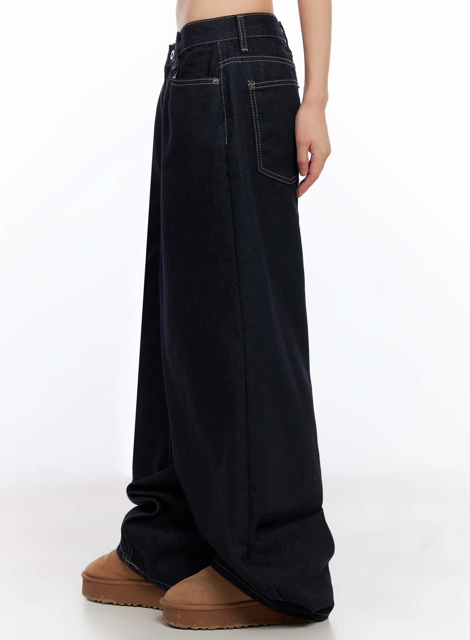 Jazlyn Non-Fade Button Wide Leg Jeans IN503 in dark blue, side view on model, displaying the long inseam, contrast topstitching along seams, and voluminous wide-leg silhouette over tan clogs.