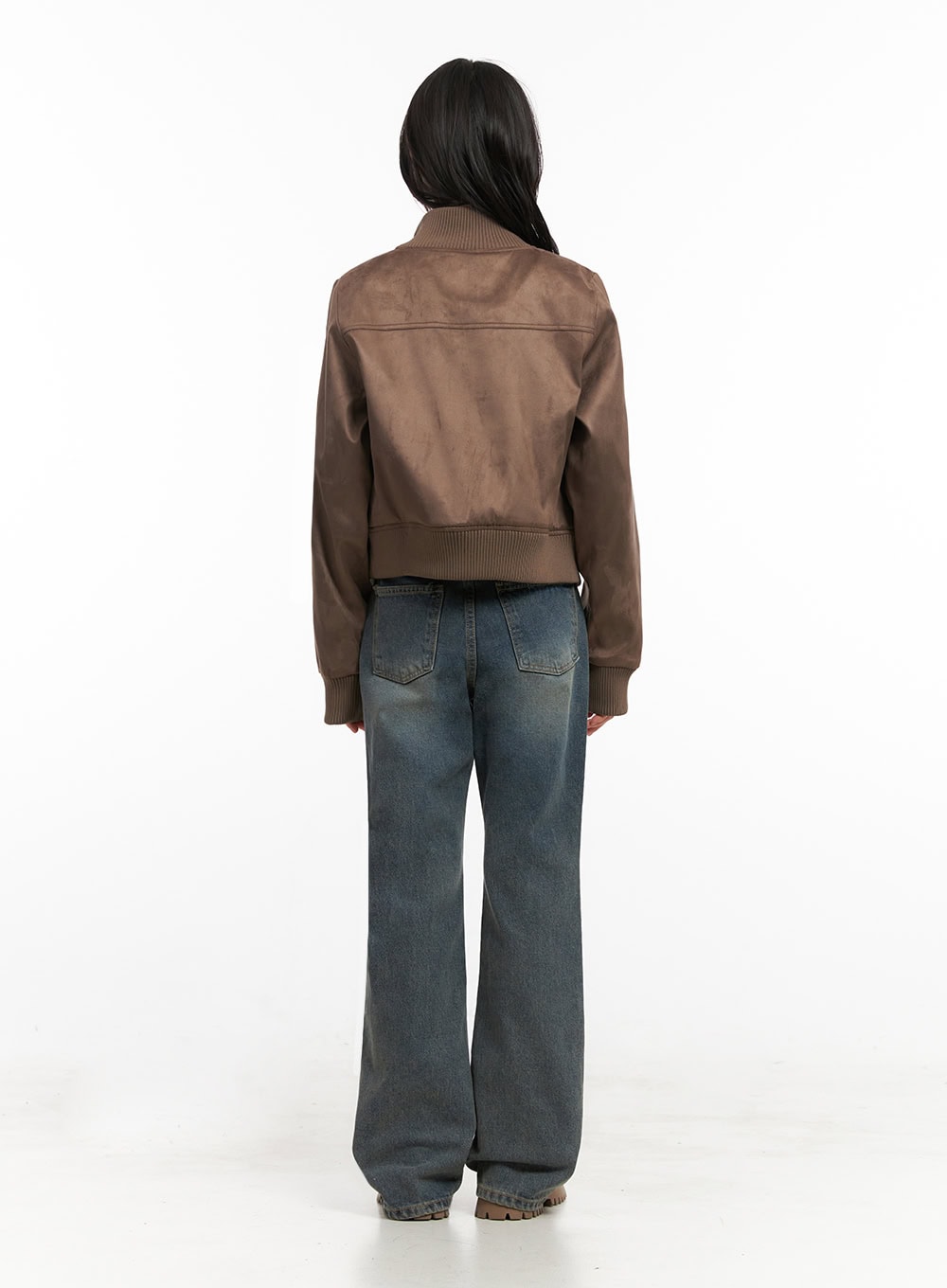 Asher Slimline Washed Bootcut Jeans ID402 in vintage blue, back full-length view on model, two back pockets with contrast stitching, slight bootcut flare, washed denim finish, brown bomber jacket above.