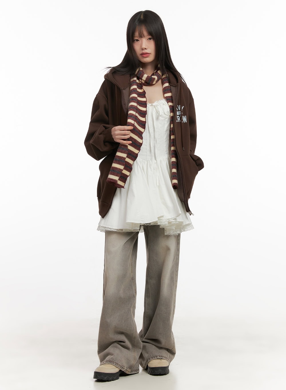Hollie Vintage Wide-Leg Jeans CD426 in gray, full-body layered editorial on model, baggy washed denim worn with white lace mini dress, brown zip hoodie, and striped knit scarf.