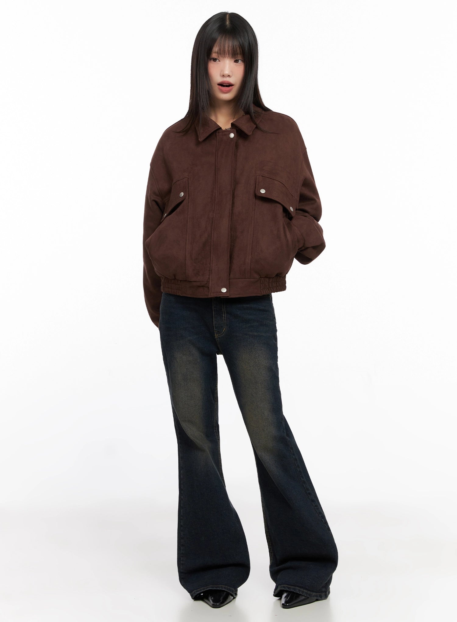 Lyanna Vintage Wash Bootcut Jeans IN503 in dark blue, full-body front styling shot, model in brown oversized suede jacket, showcasing casual autumn outfit with bootcut flare.