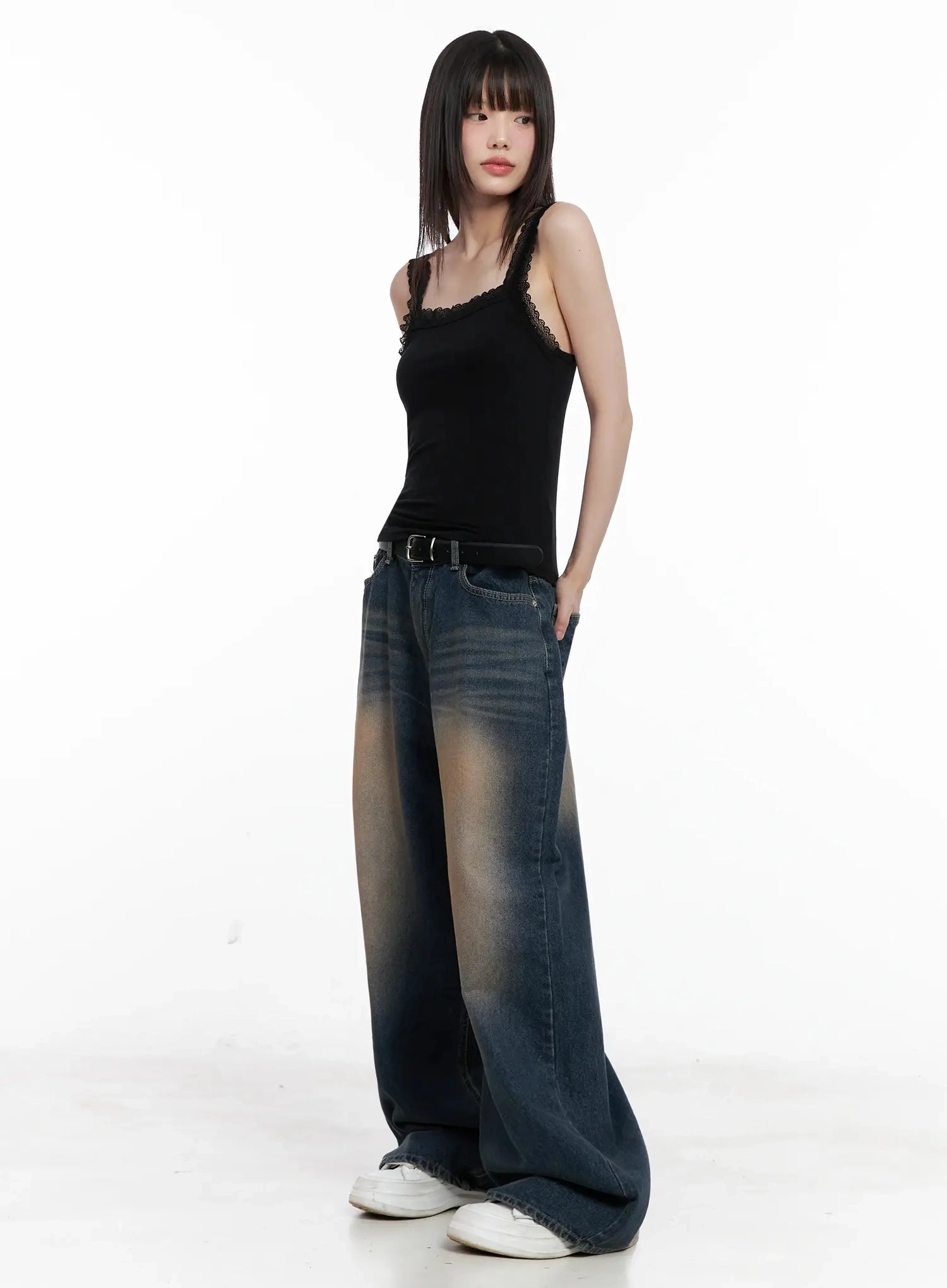 Solji Acid Washed Wide-Leg Jeans IL531 in dark blue, full-body three-quarter side shot on model in black lace cami, acid-wash thigh fading and floor-grazing wide hem visible.
