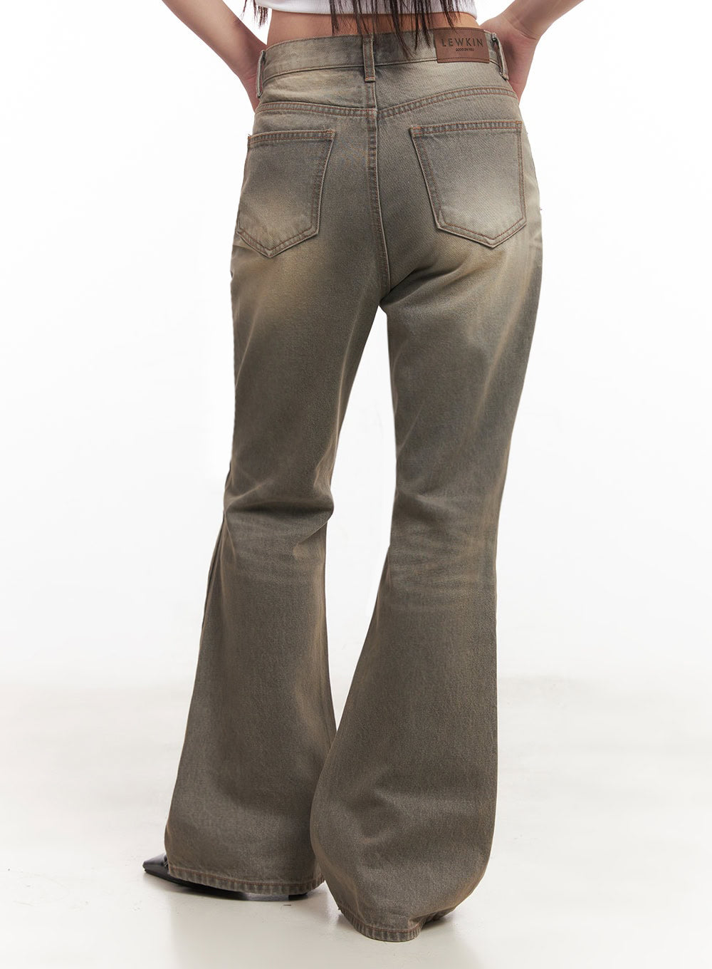 Sherry Washed Slim-Fit Bootcut Jeans IM528 in vintage brown, full back view on model, back pockets with orange stitching, LEWKIN leather label on waistband, flared bootcut silhouette.