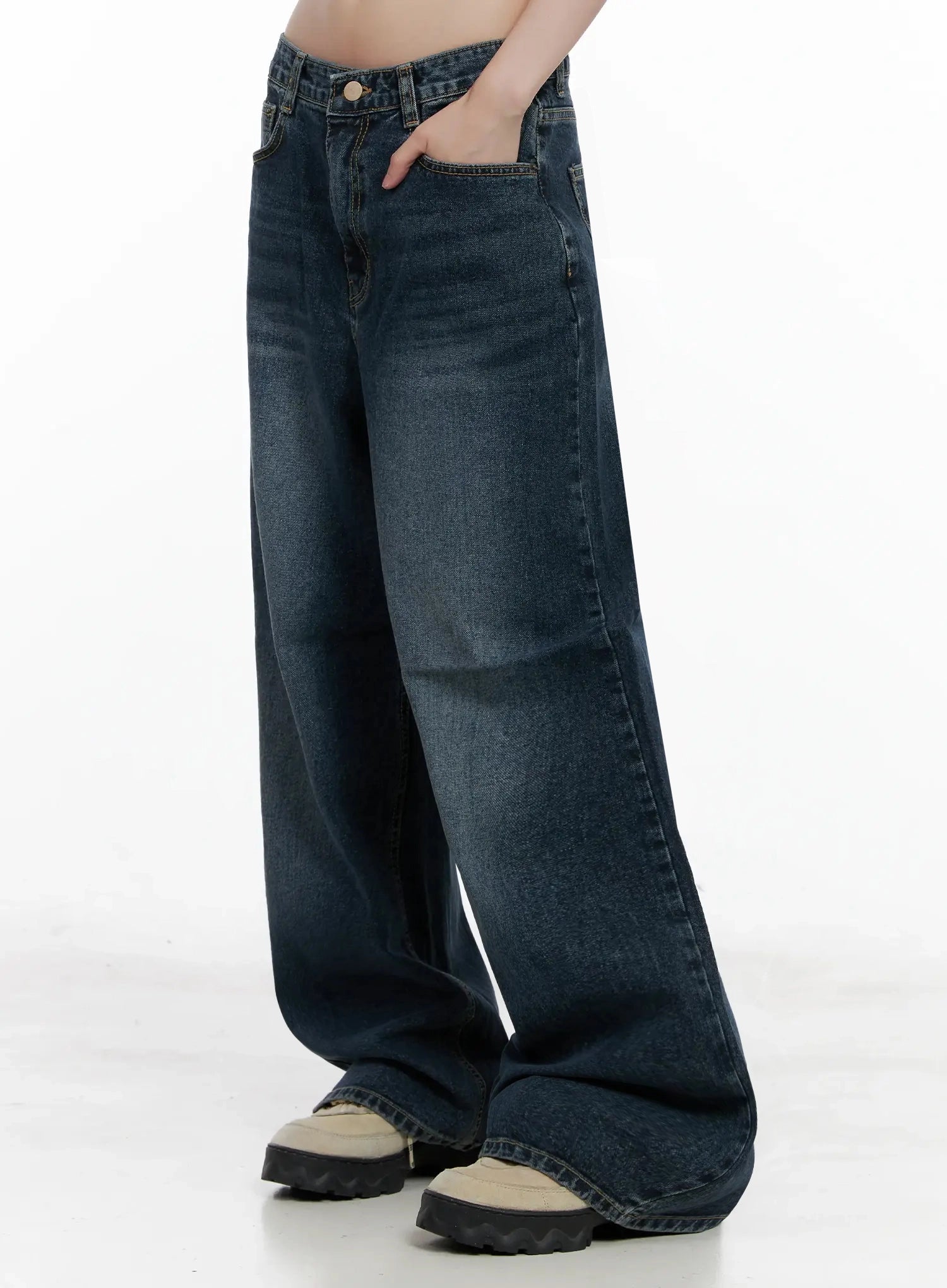 Mashiro Vintage-Wash Wide Jeans IL531 in dark blue, side lower-body view on model with hand in pocket, emphasizing wide-leg drape, contrast side seam, and vintage-wash fade on long cotton denim.