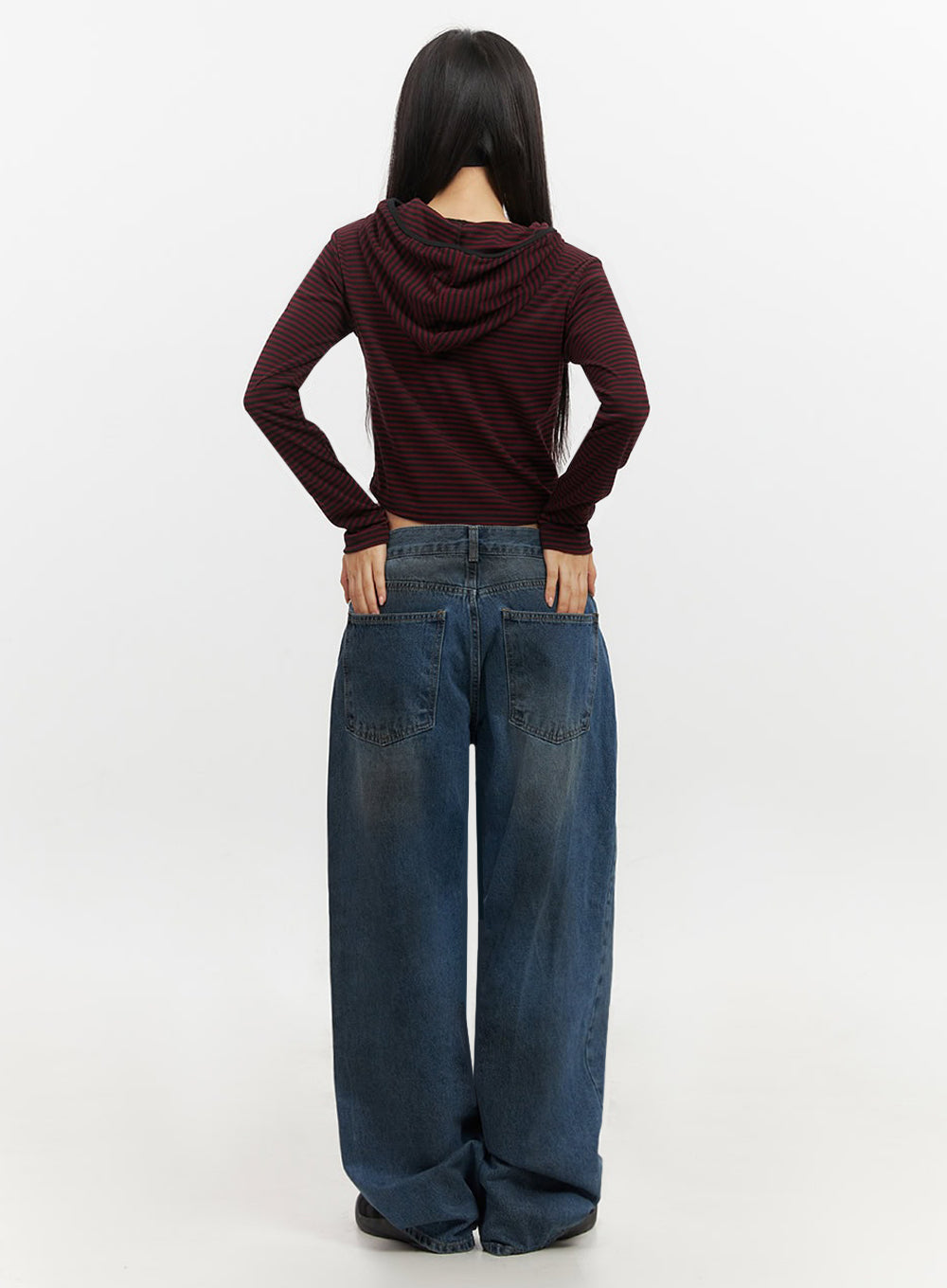 Brianna Dark Washed Wide-Leg Jeans IF510 in dark washed blue, back full-body on model hands on hips, dual patch pockets and wide-leg sweep visible, dark washed cotton denim with fade detail.