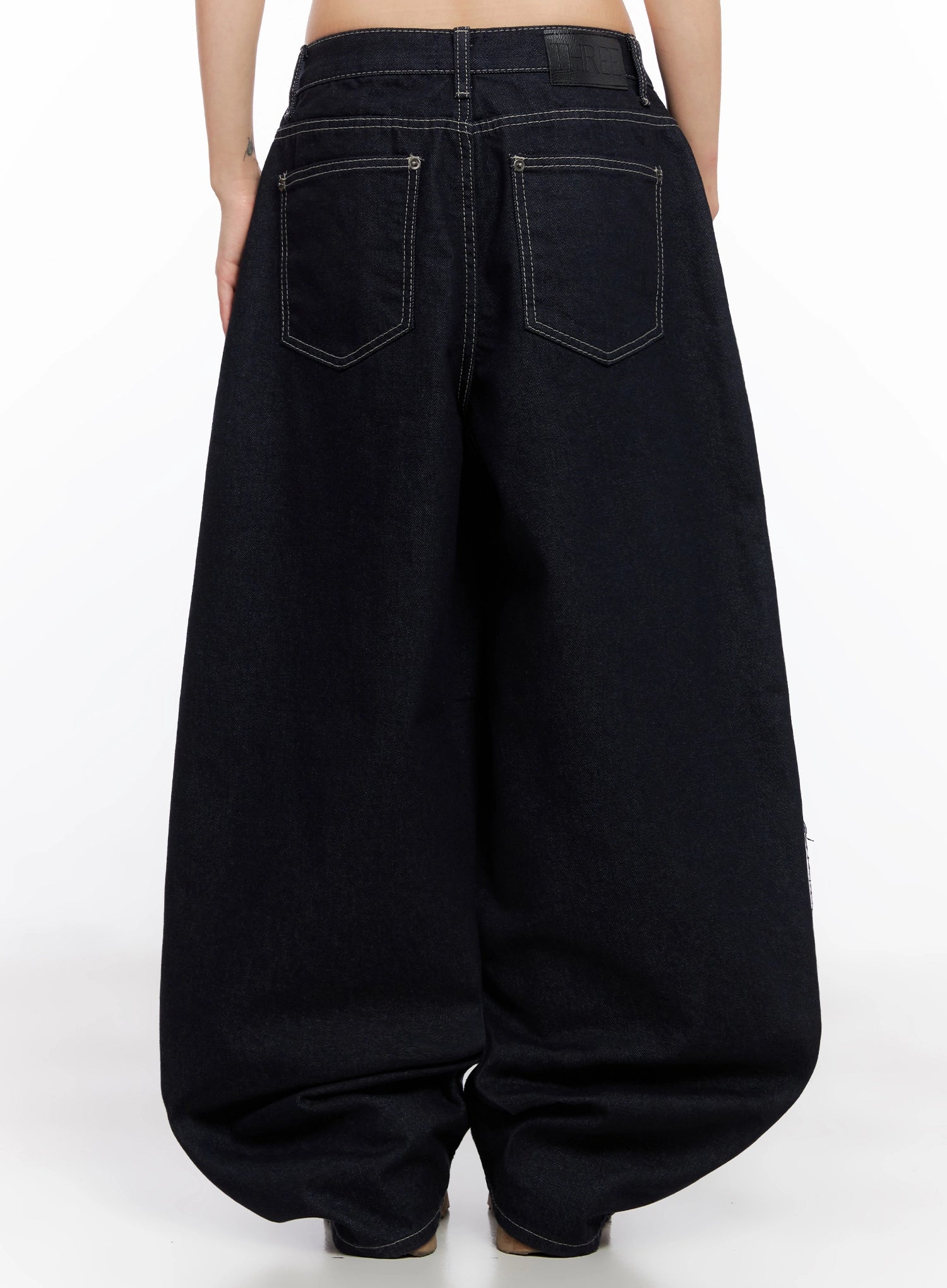 Jazlyn Non-Fade Button Wide Leg Jeans IN503 in dark blue, back view on model, featuring two rear patch pockets with contrast stitching, leather brand tab at waistband, and balloon leg shape.