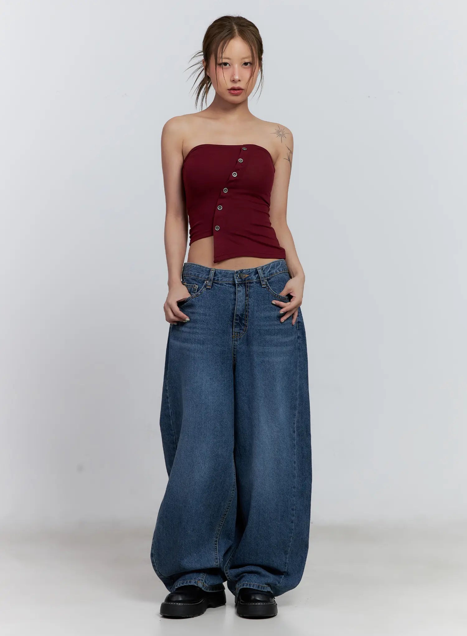 Shuhua Washed Wide-Leg Denim Jeans CL510 in dark blue, full-length front shot, styled with burgundy asymmetric strapless crop top, low-rise fit with dramatic wide leg.